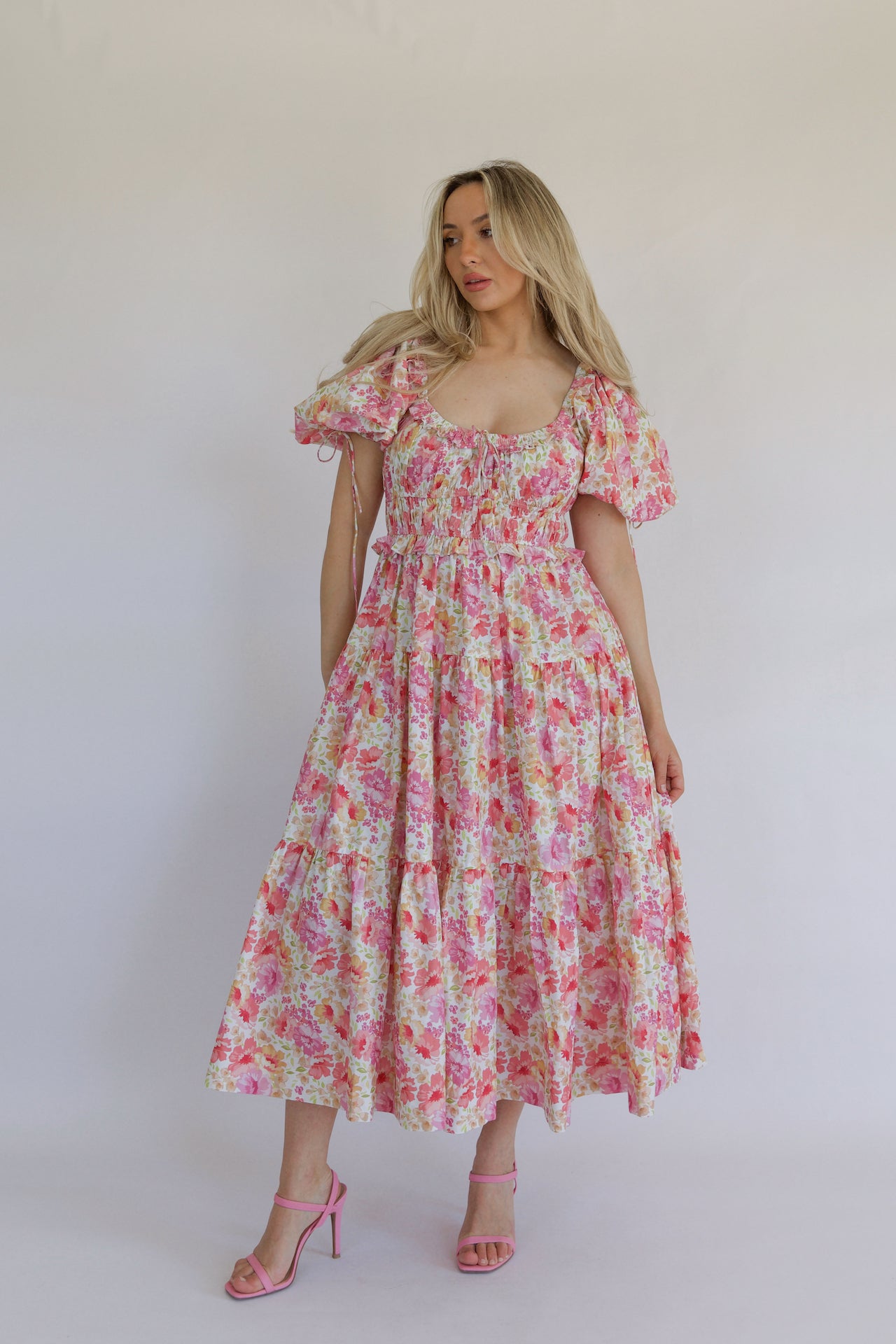 pink floral tiered maxi dress with pockets and puff sleeves