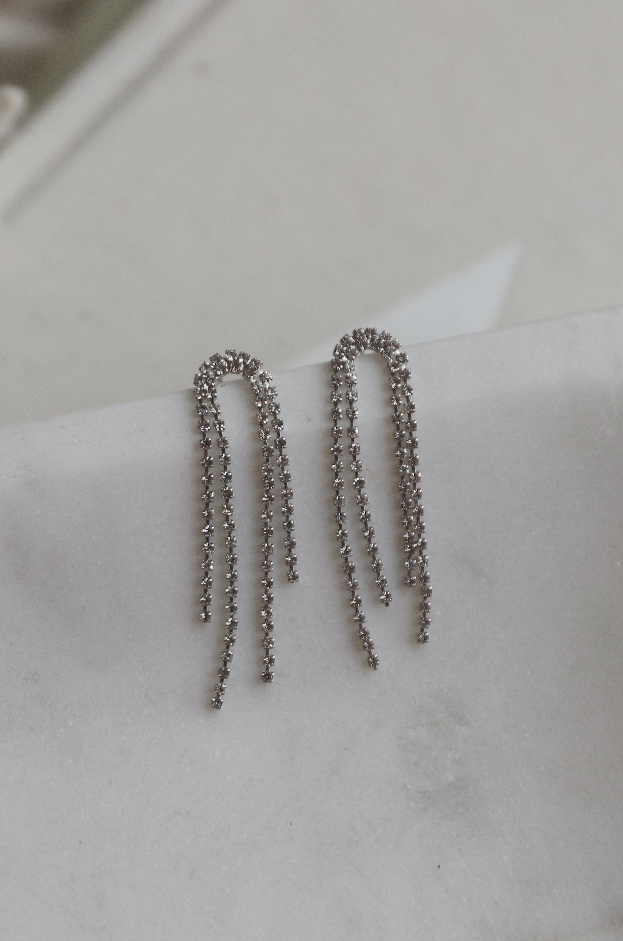 silver diamond rhinestone arch drop earrings