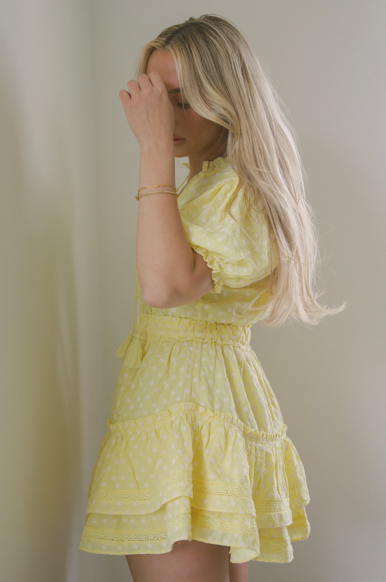 yellow embroidered ruffle tiered mini dress with embroidered floral print and lace trim detail