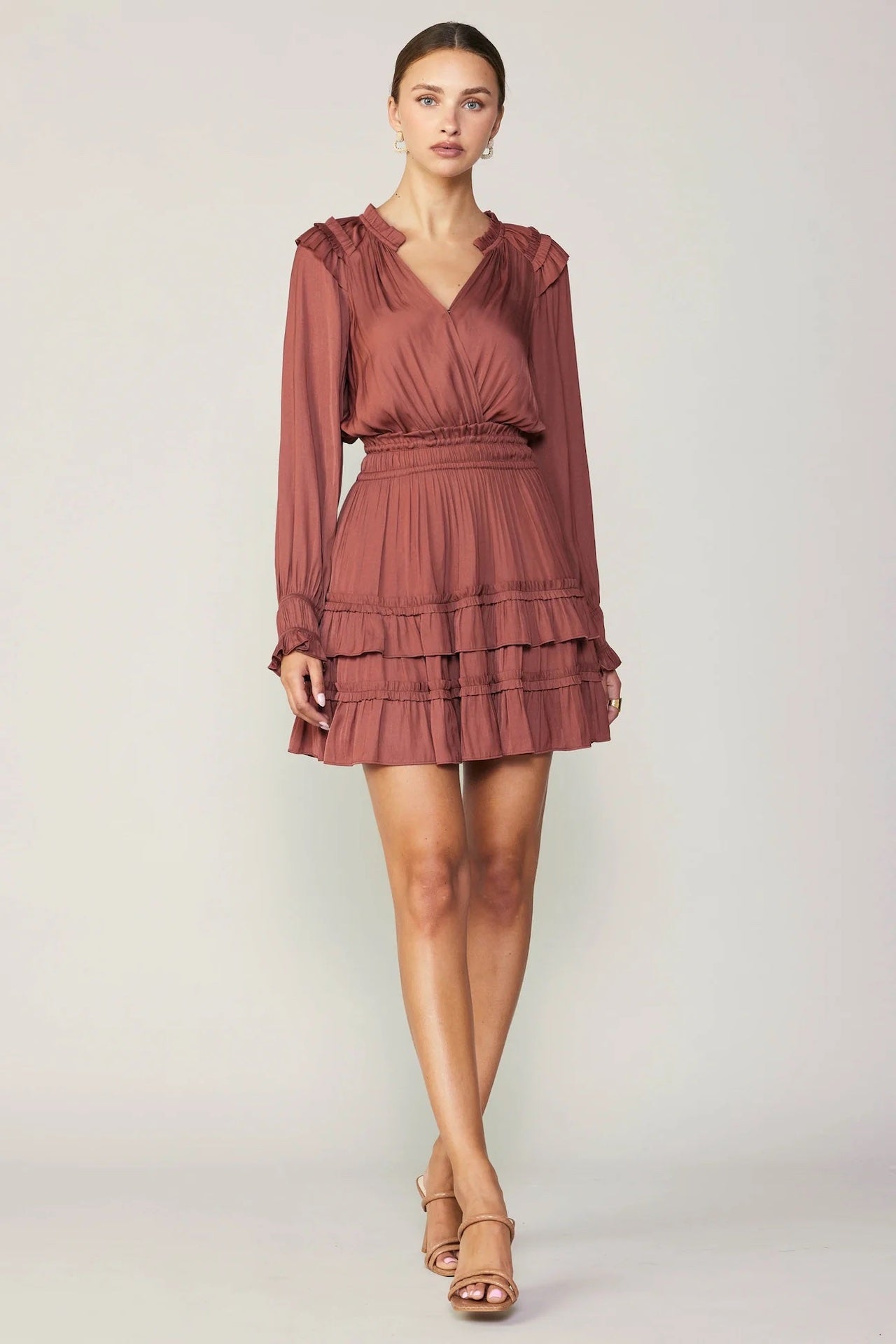 rust ruffled mini dress with long sleeves