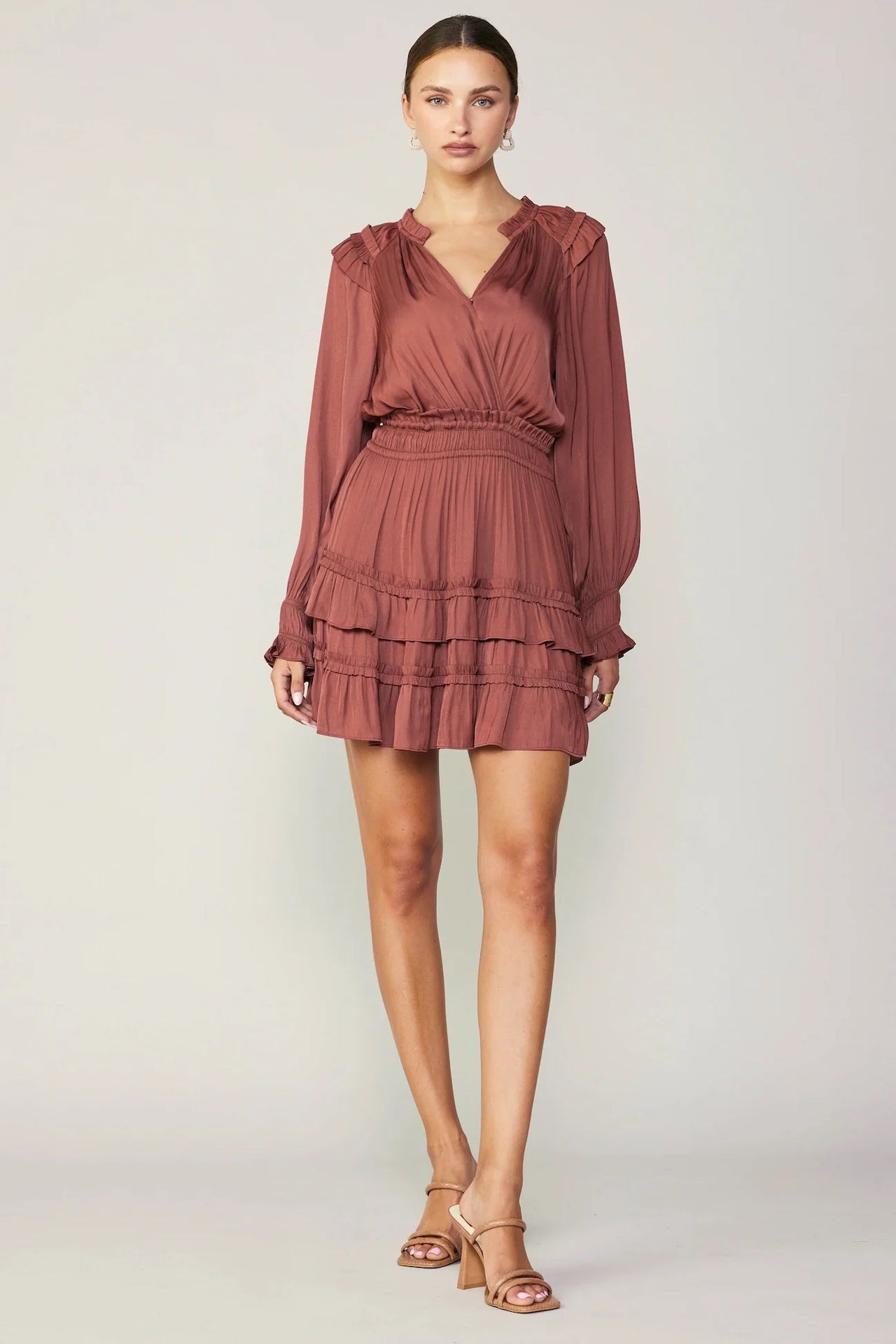 rust ruffled mini dress with long sleeves