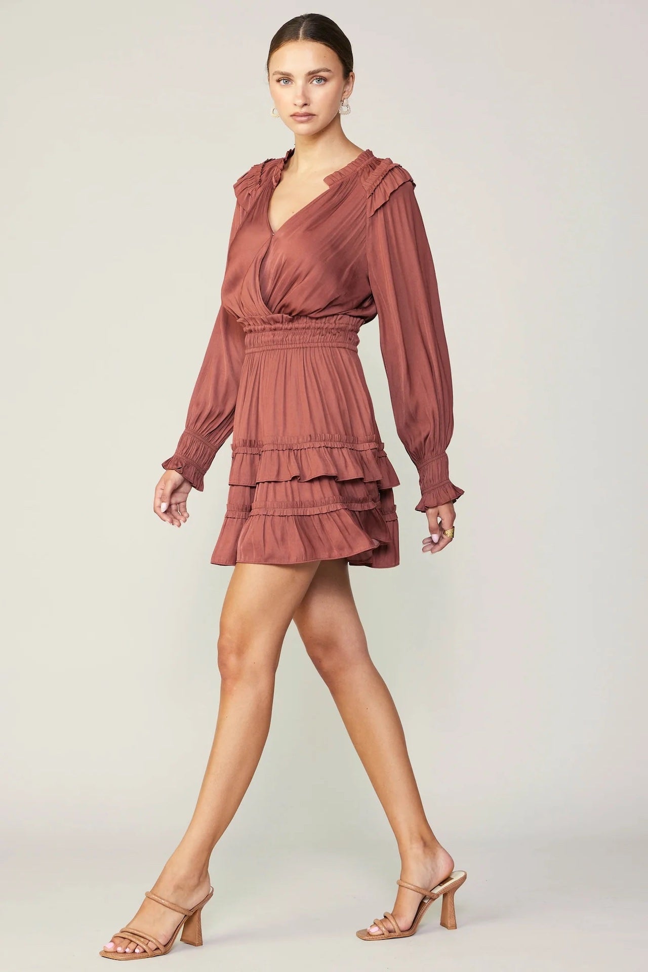 rust ruffled mini dress with long sleeves