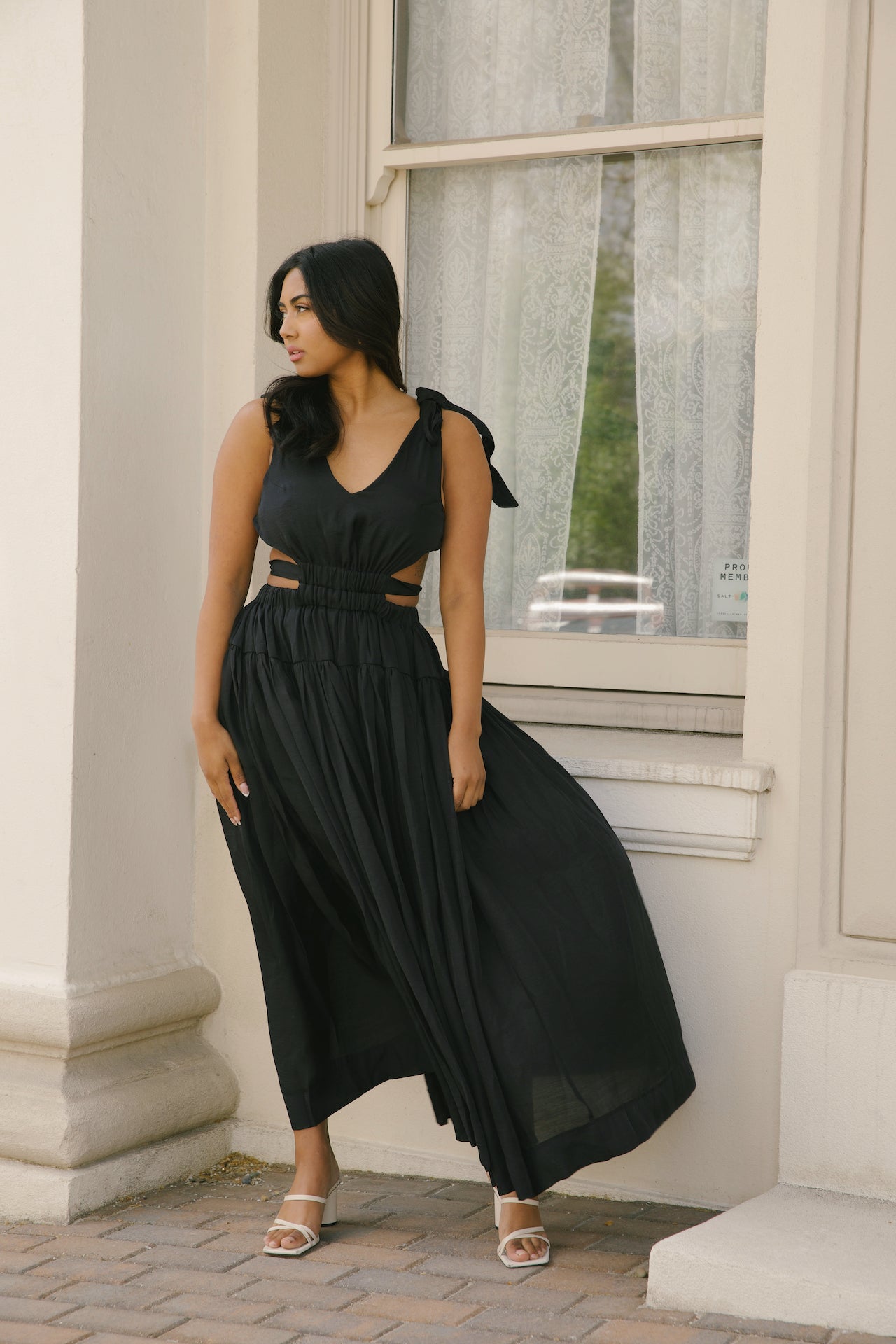 black cut out maxi dress with an open back
