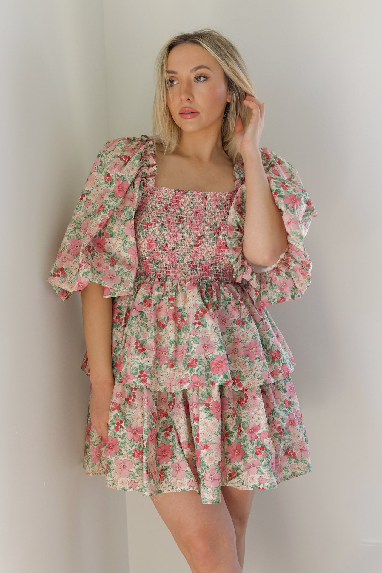 pink and green floral puff sleeve tiered mini dress that is a statement dress