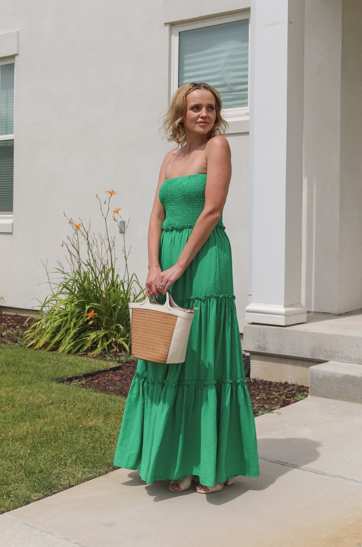 green strapless tube top maxi dress with a smocked bodice