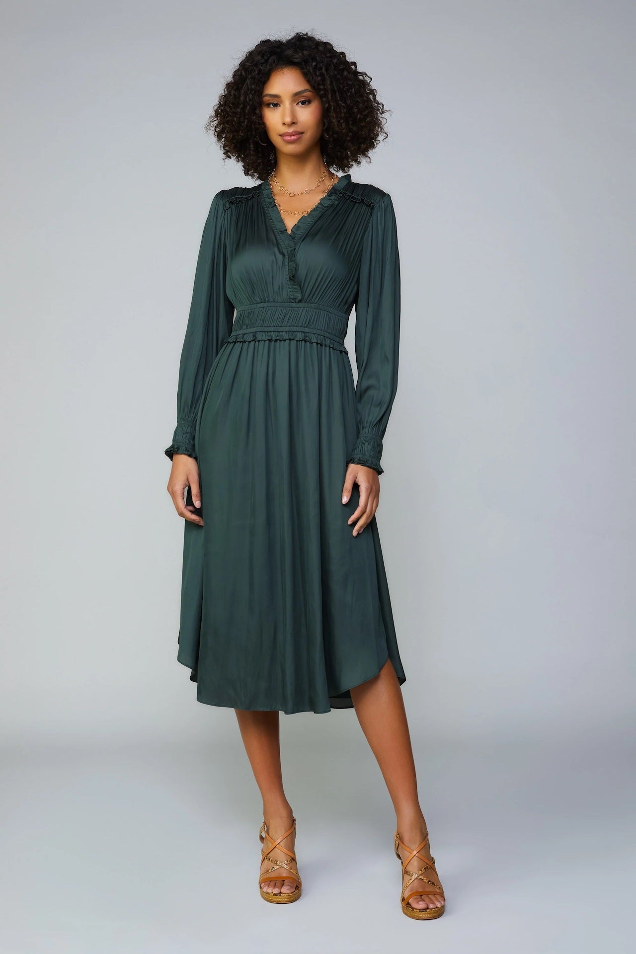 silky green surplice bodice midi dress with long sleeves
