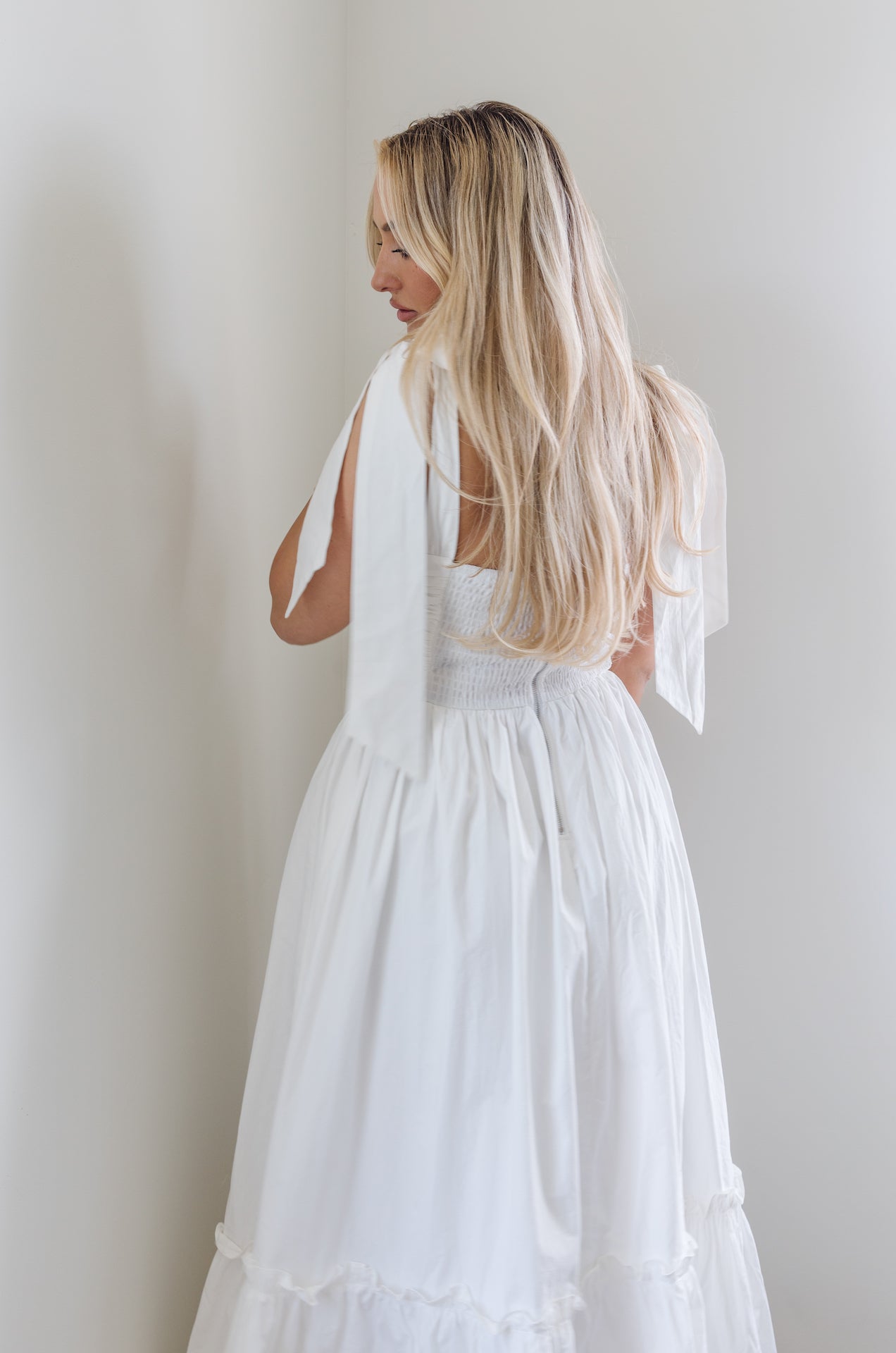 white midi poplin dress with bow on shoulders