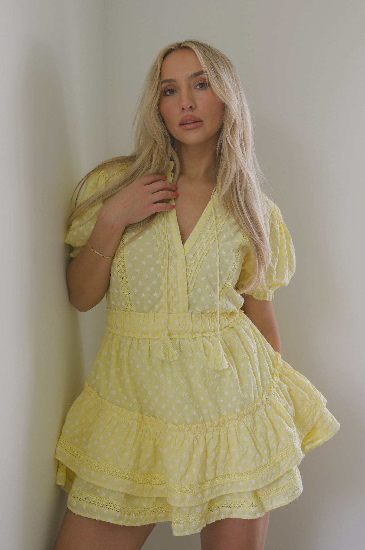 yellow embroidered ruffle tiered mini dress with embroidered floral print and lace trim detail