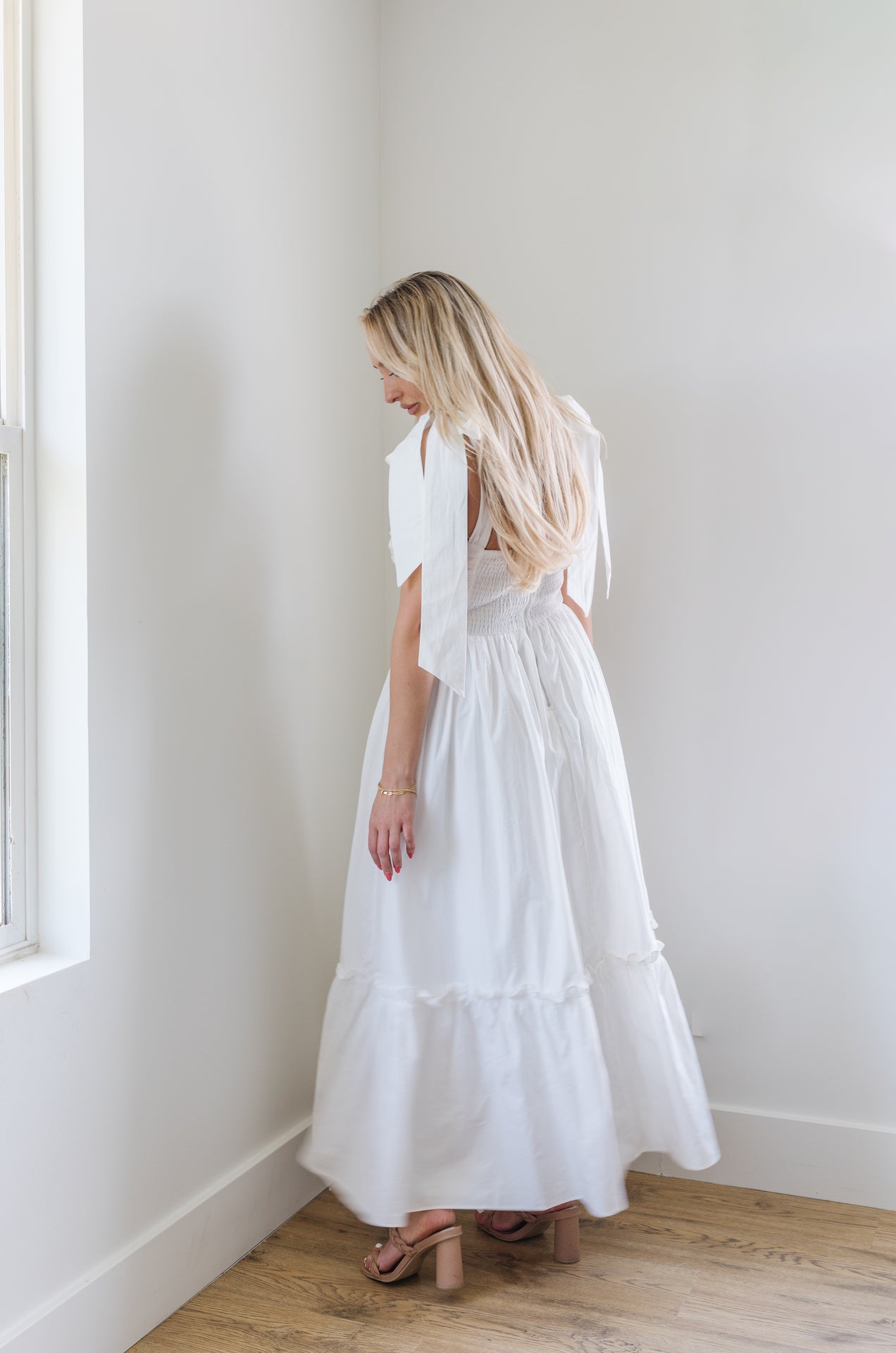white midi poplin dress with bow on shoulders