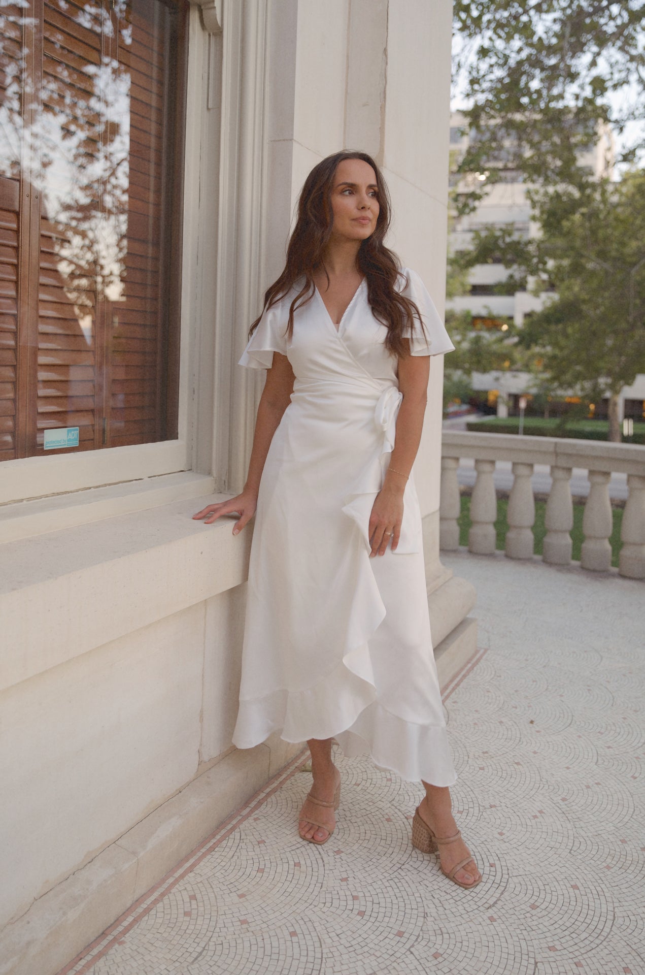 wrap white satin midi dress with flutter sleeves