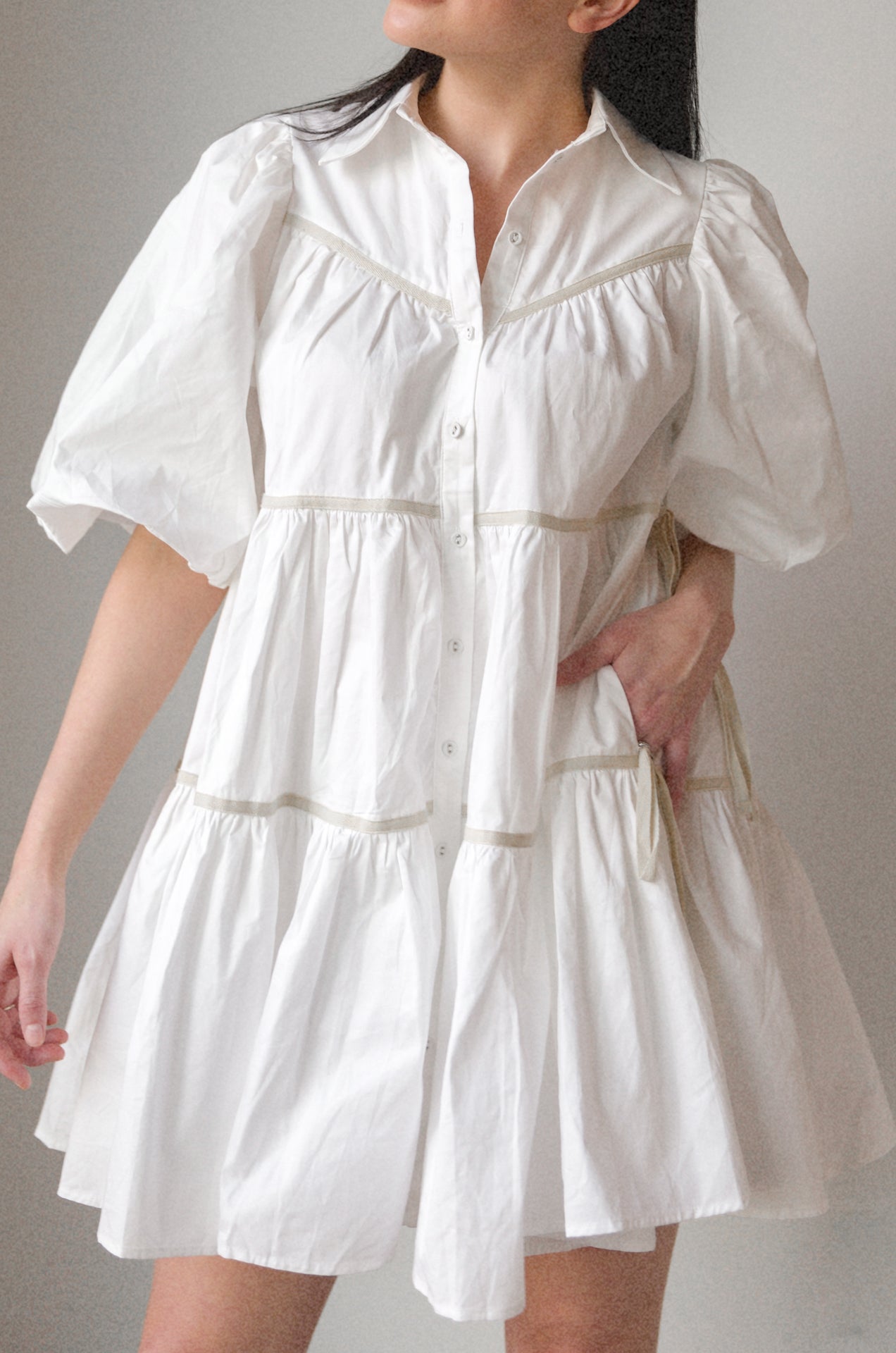 white puff sleeve tiered babydoll mini dress