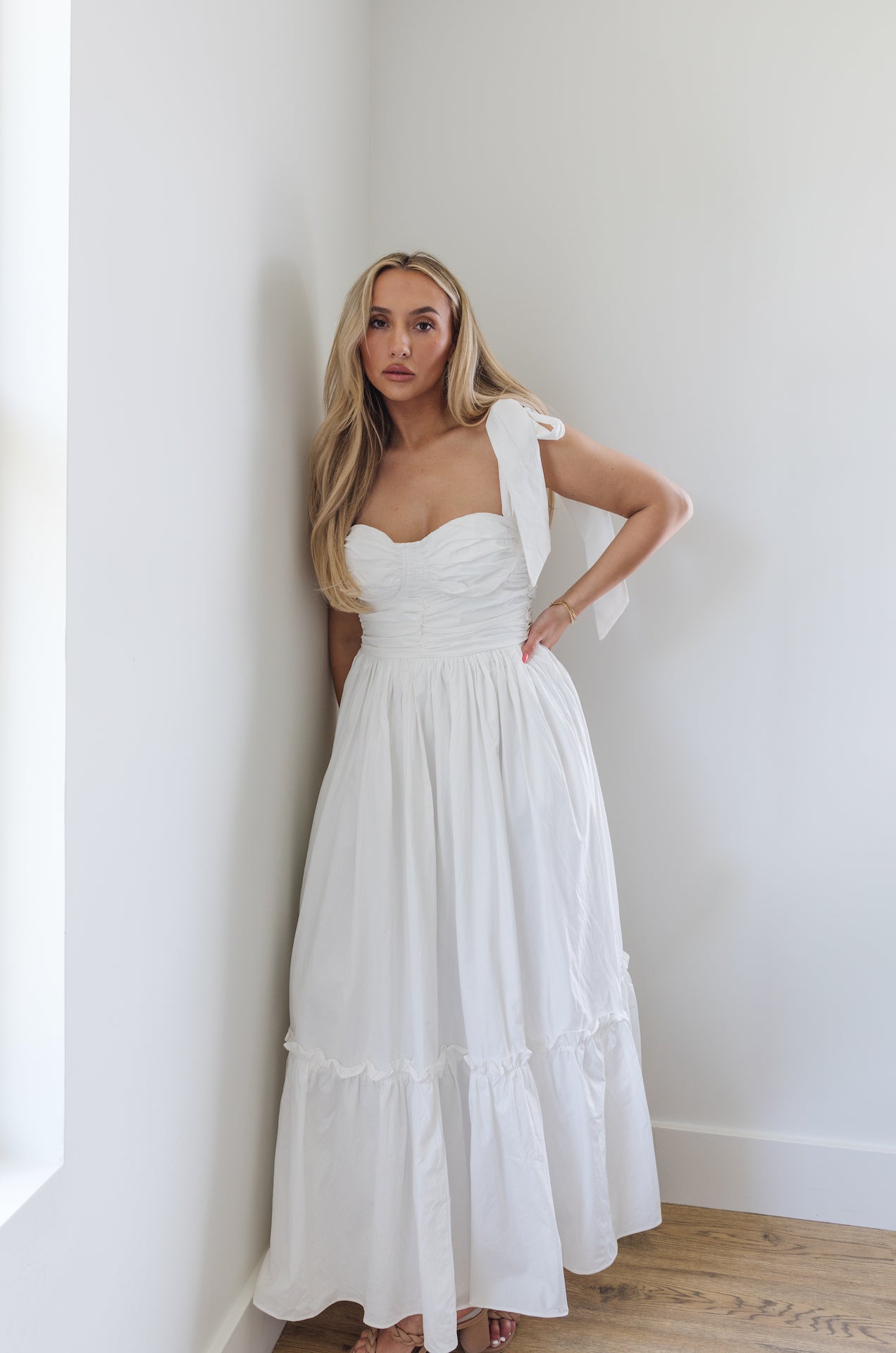 white midi poplin dress with bow on shoulders