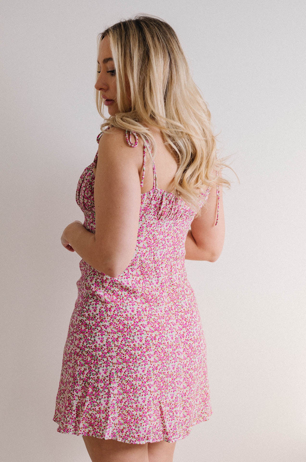 spaghetti strap pink ditsy floral mini dress