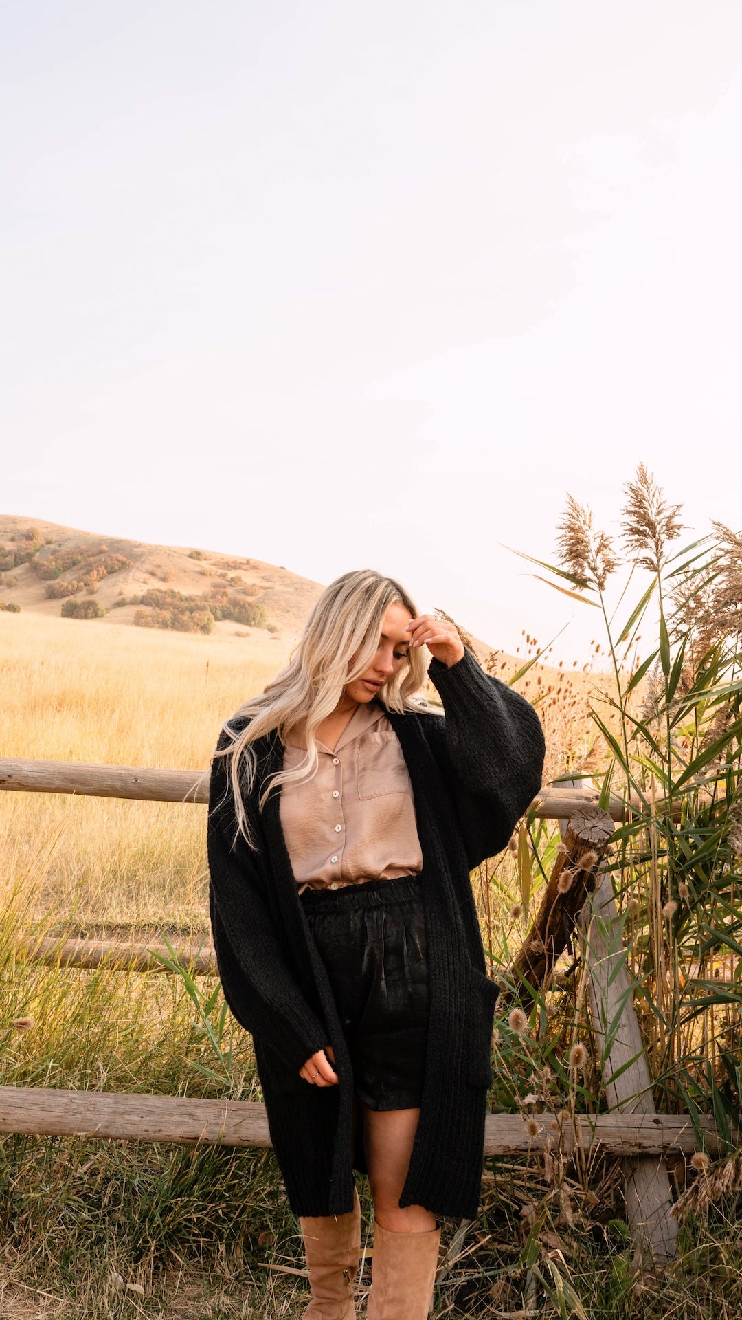 black chunky knit cardigan with pockets and balloon sleeves