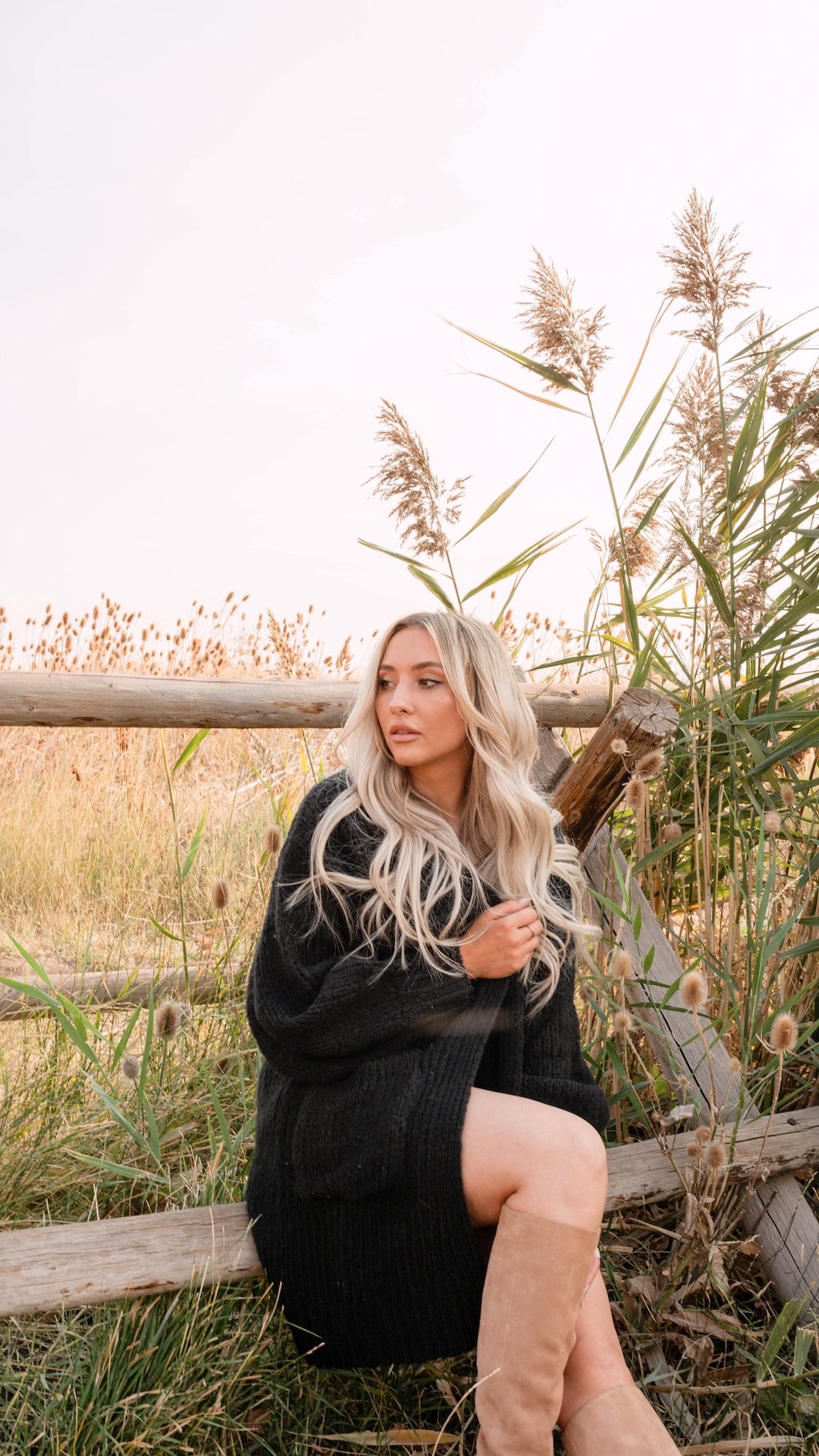 black chunky knit cardigan with pockets and balloon sleeves