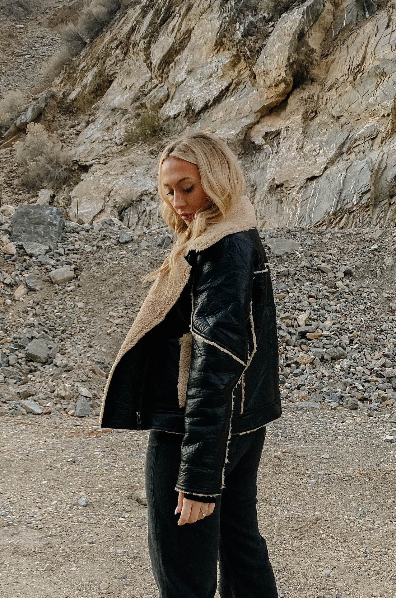 womens black faux leather biker jacket with shearling trim and interior