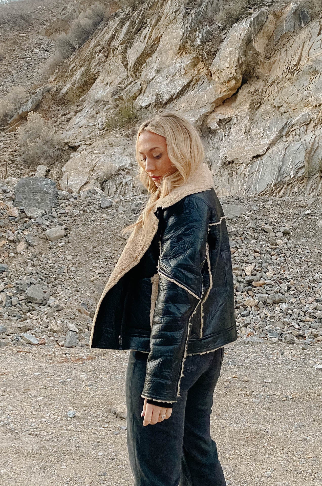 womens black faux leather biker jacket with shearling trim and interior