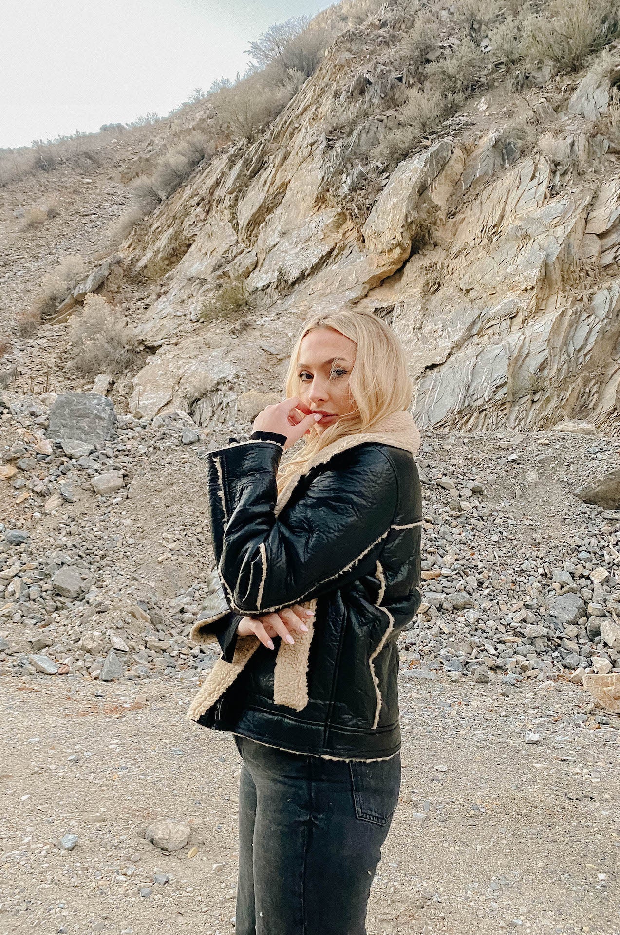 womens black faux leather biker jacket with shearling trim and interior