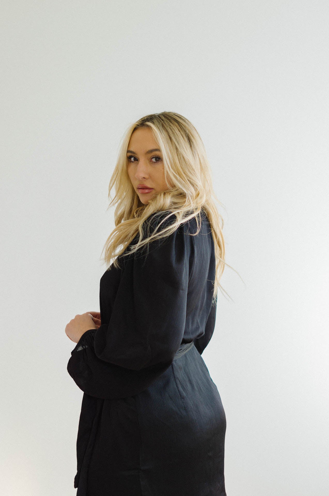 black wrap mini dress with long sleeves