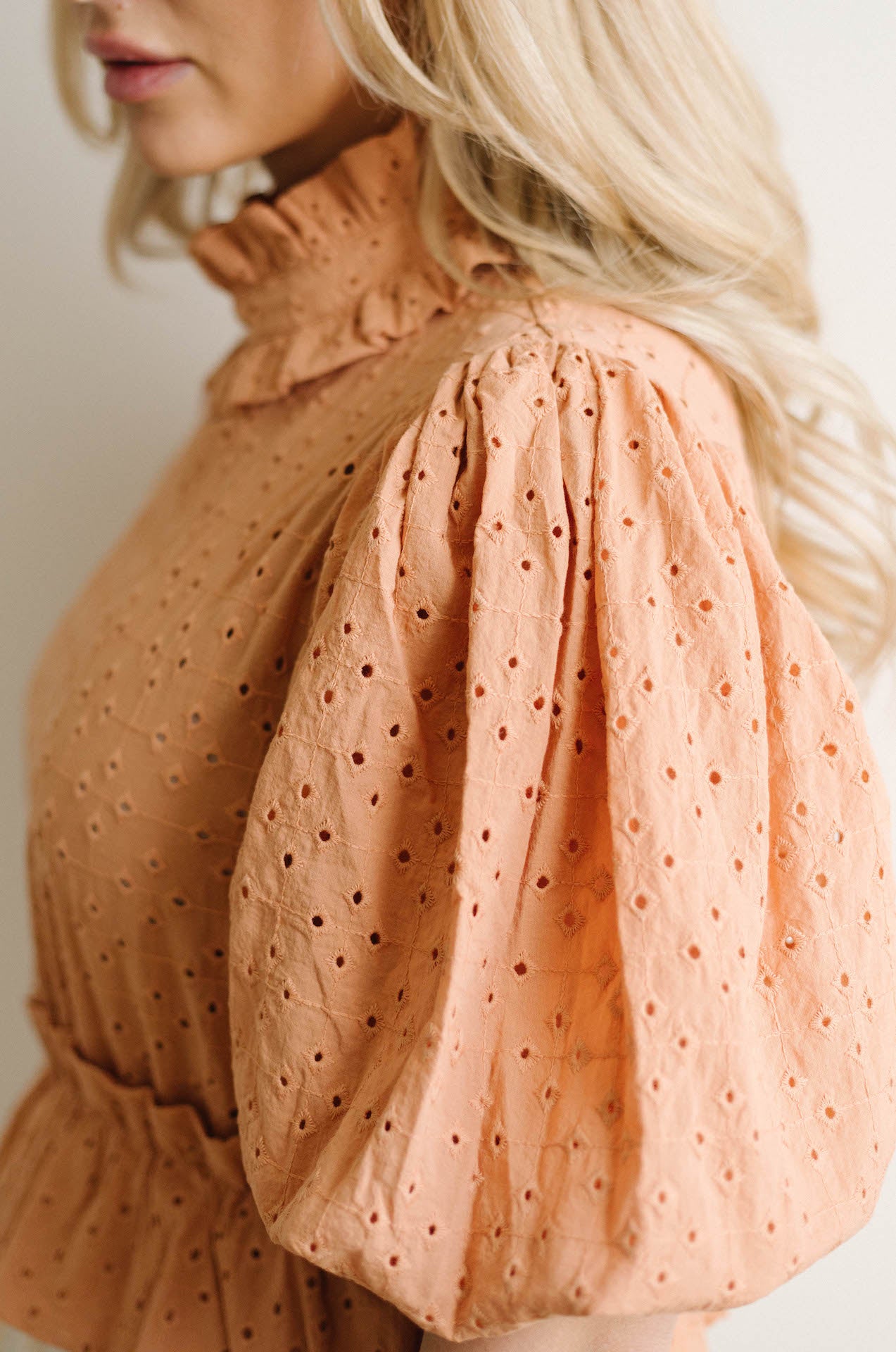 orange eyelet embroidered puff sleeve crop top
