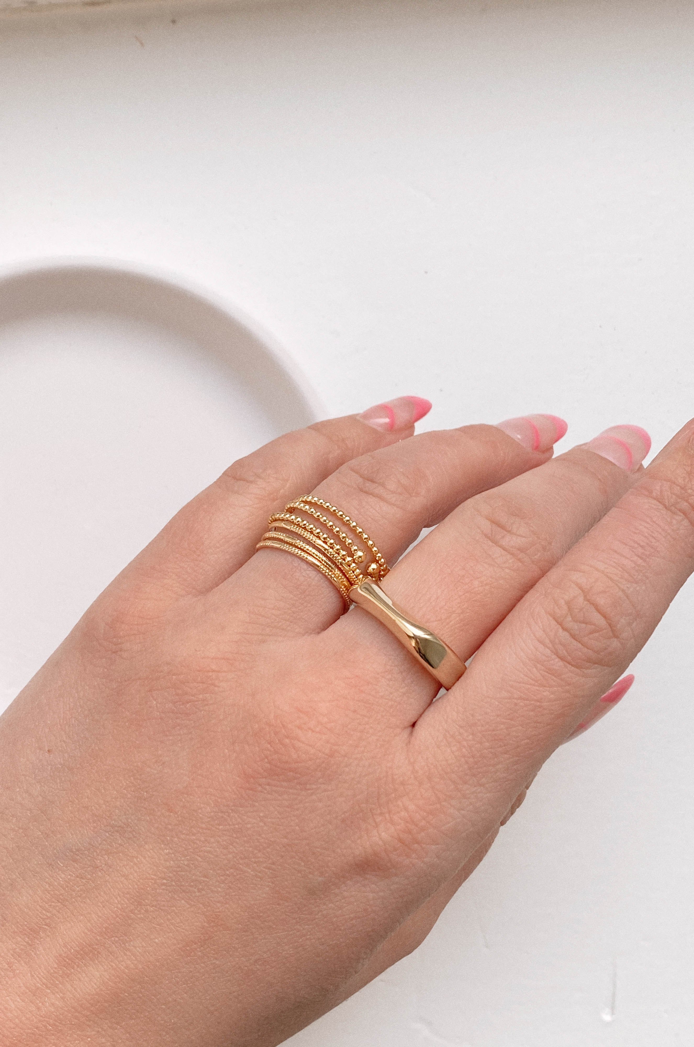 trendy gold ring that is modern and minimal