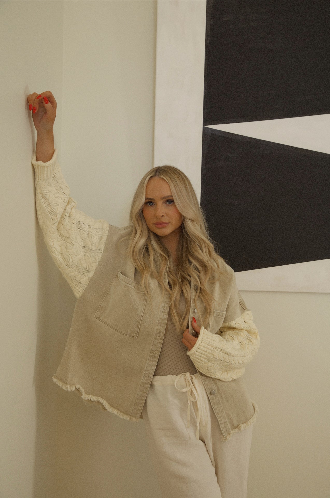cream tan overshirt with knitted sleeve shacket style