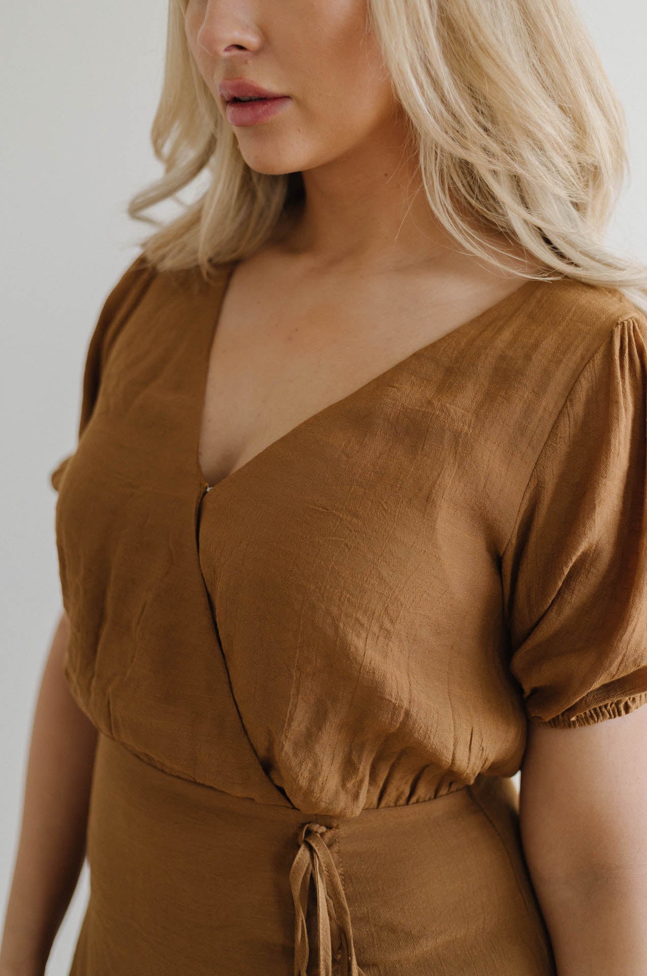 ruched front brown mini dress with sleeves