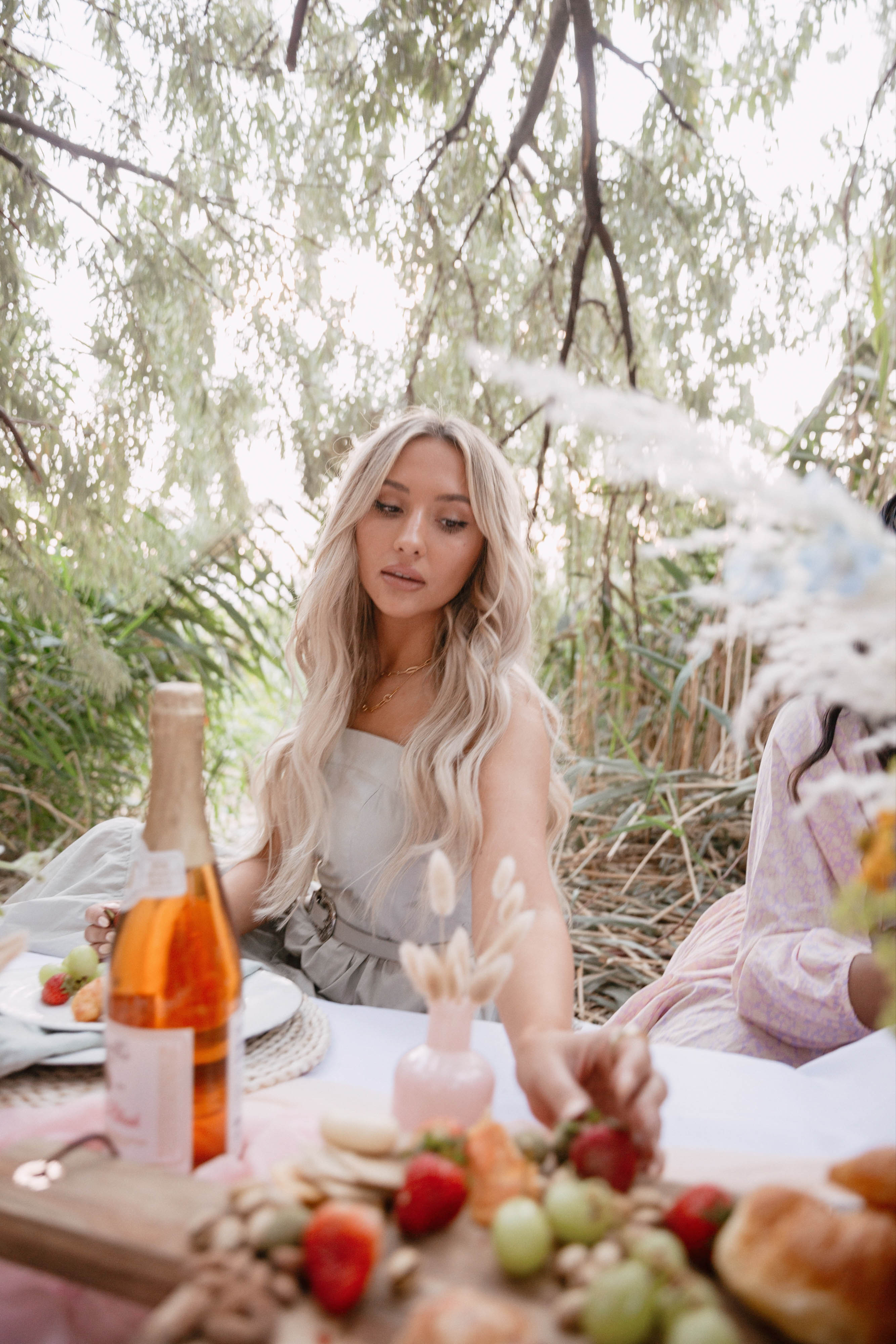 sage dress that is perfect for a girls picnic