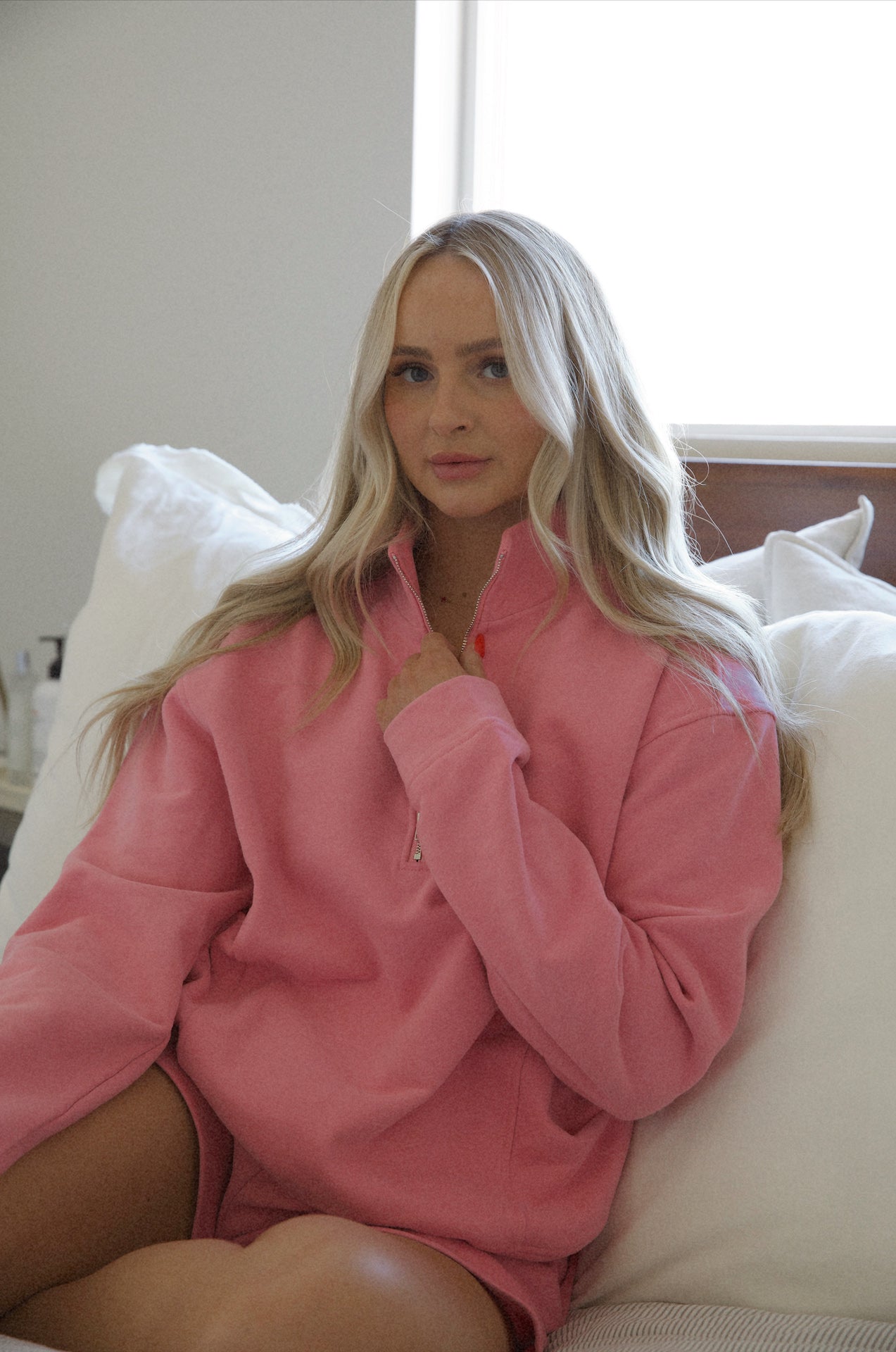 pink fleece sweatshirt and shorts set with a half zip pullover