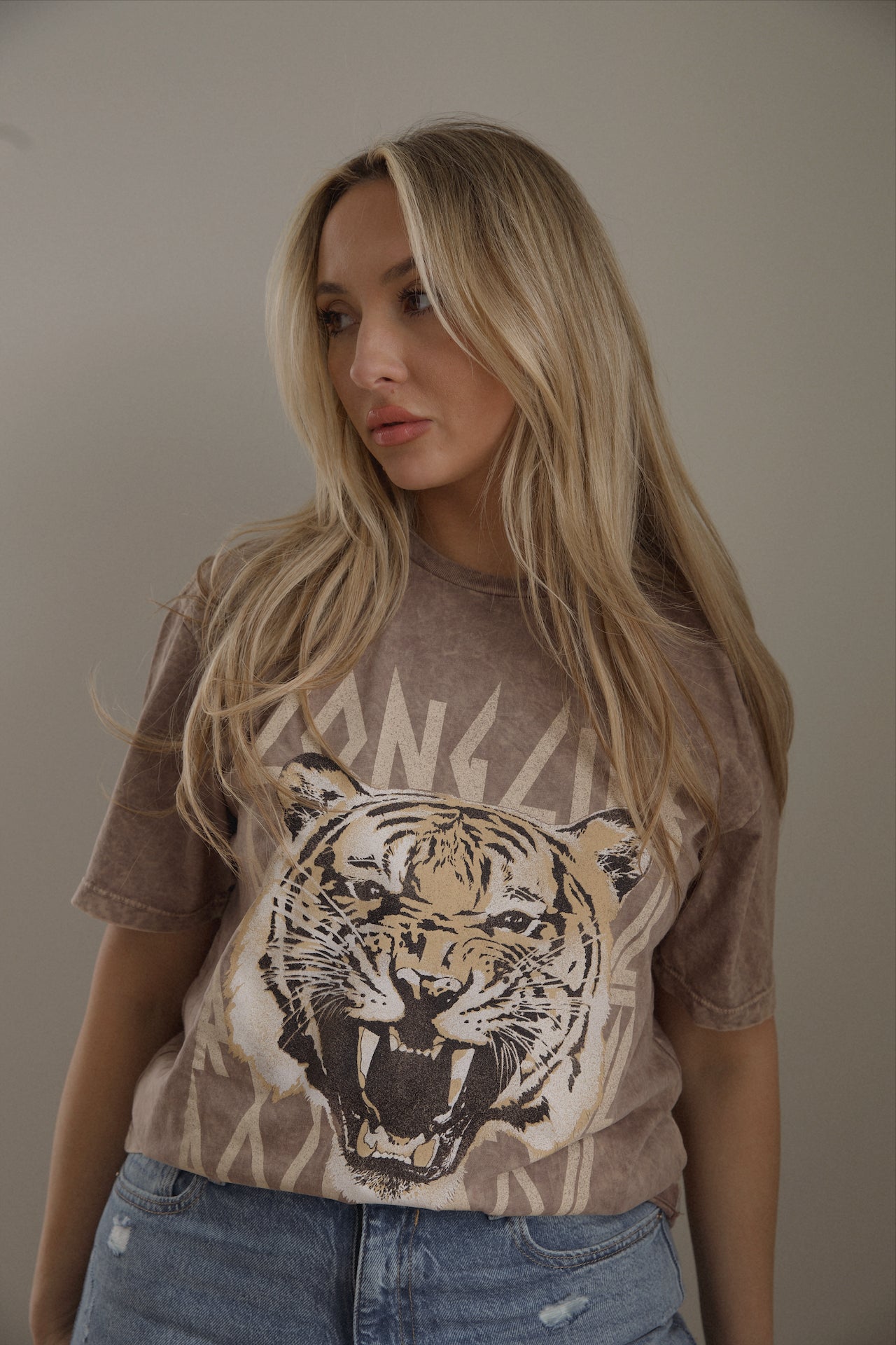 tiger print long live rock and roll graphic tee on a brown cotton tshirt