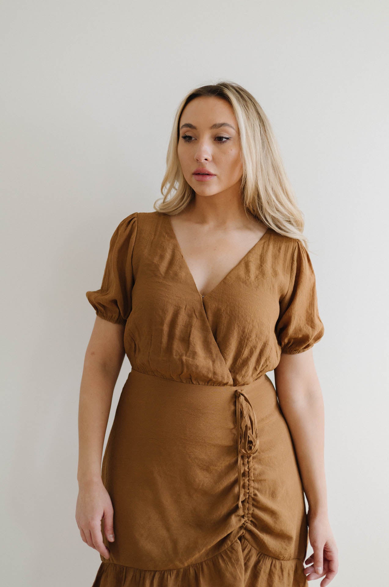 ruched front brown mini dress with sleeves