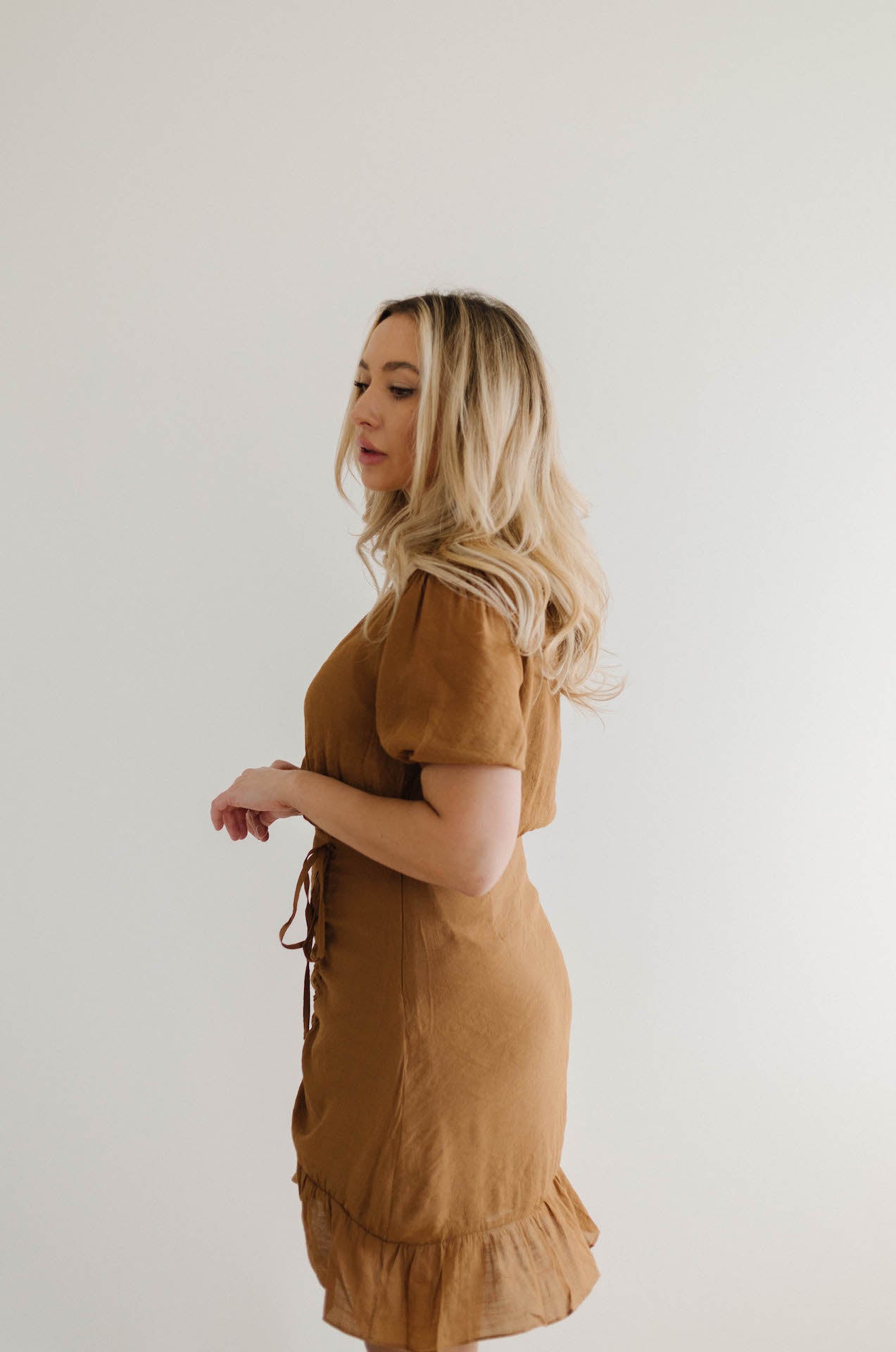 ruched front brown mini dress with sleeves
