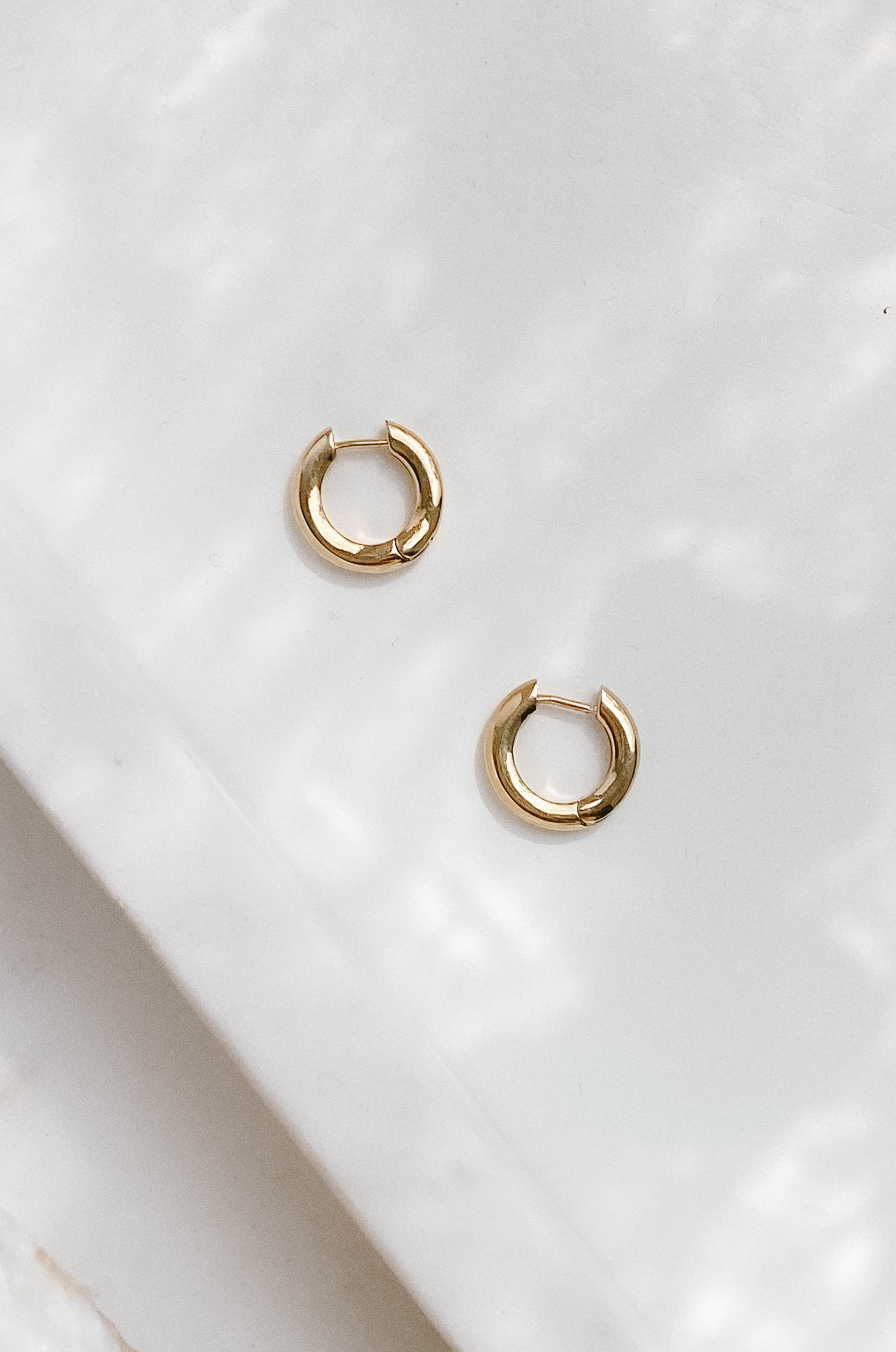 14k gold dipped modern and minimalist mini huggie hoop earrings