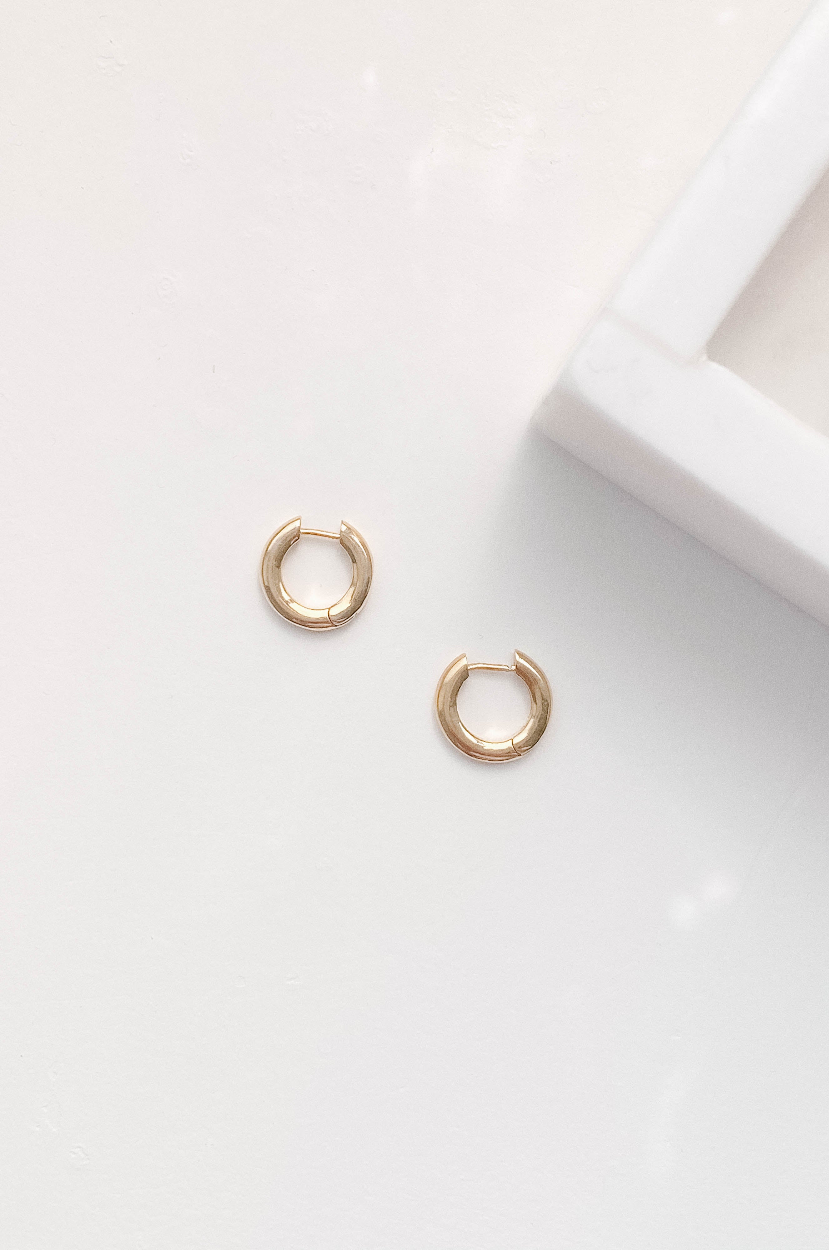 trendy lightweight and hypoallergenic huggie hoops