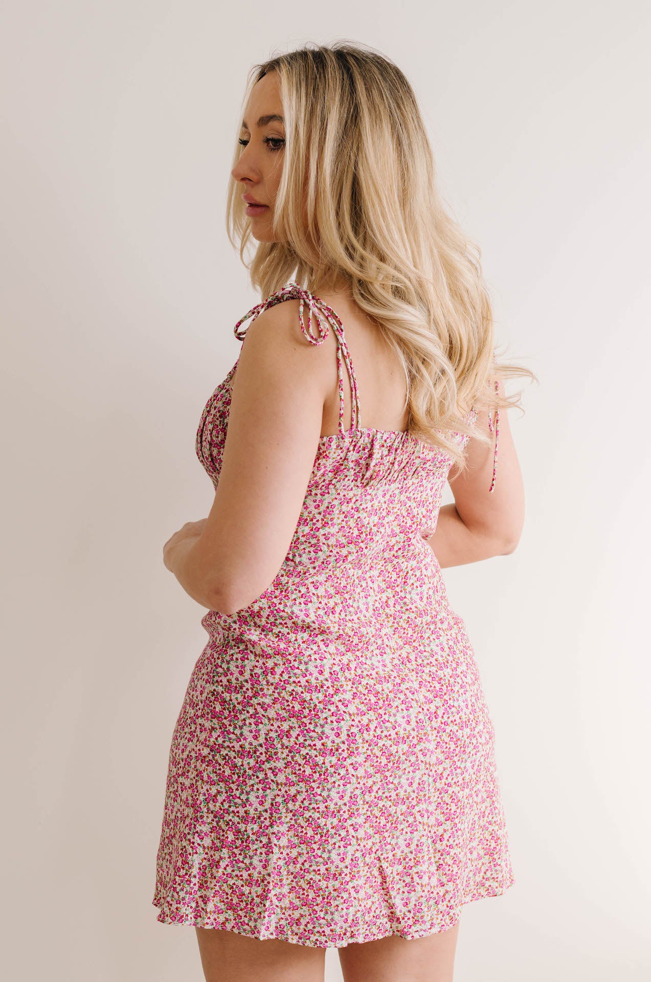 pink ditsy floral mini dress with adjustable straps