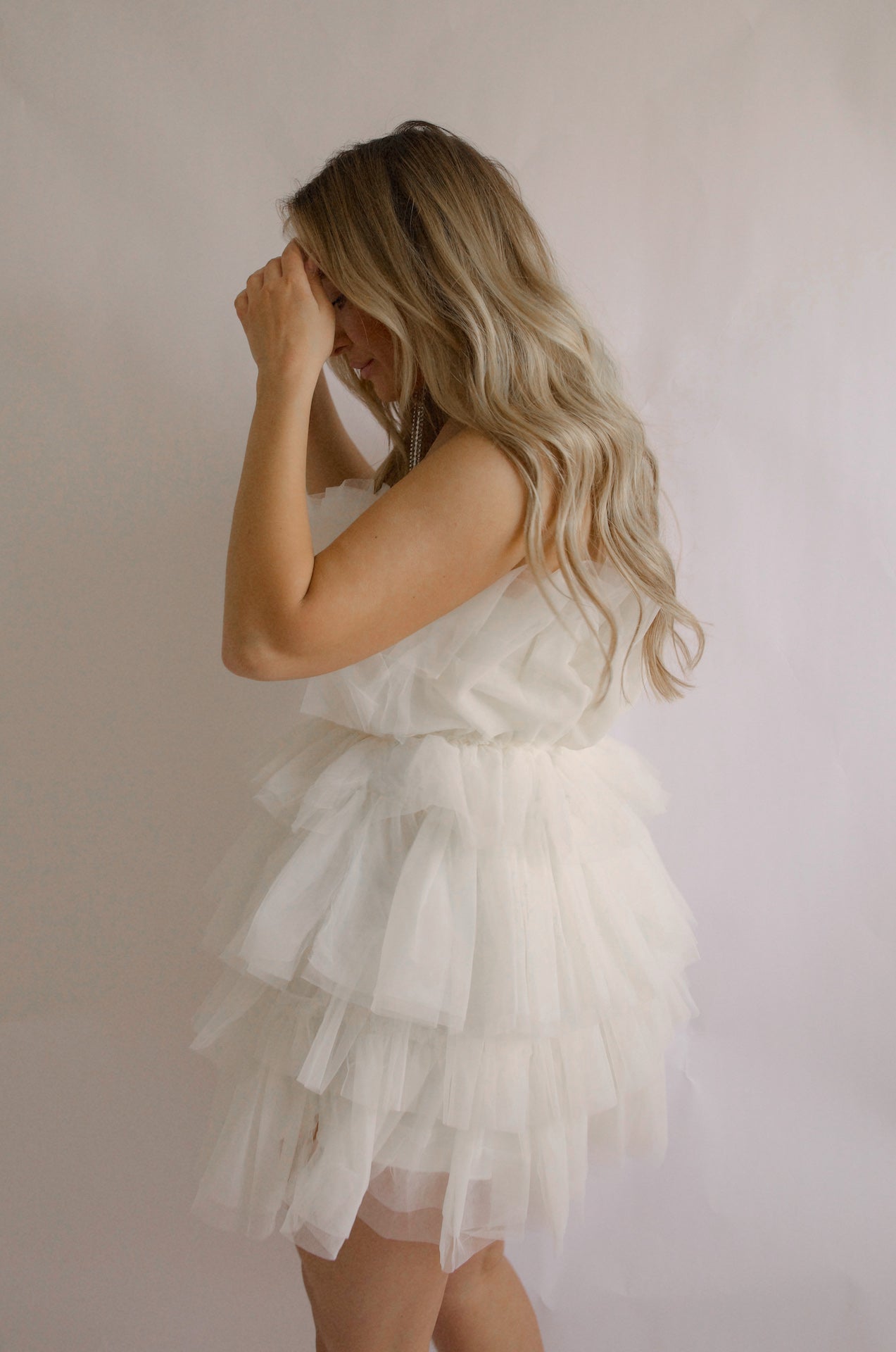 strapless tulle mini dress with a tiered cream organza