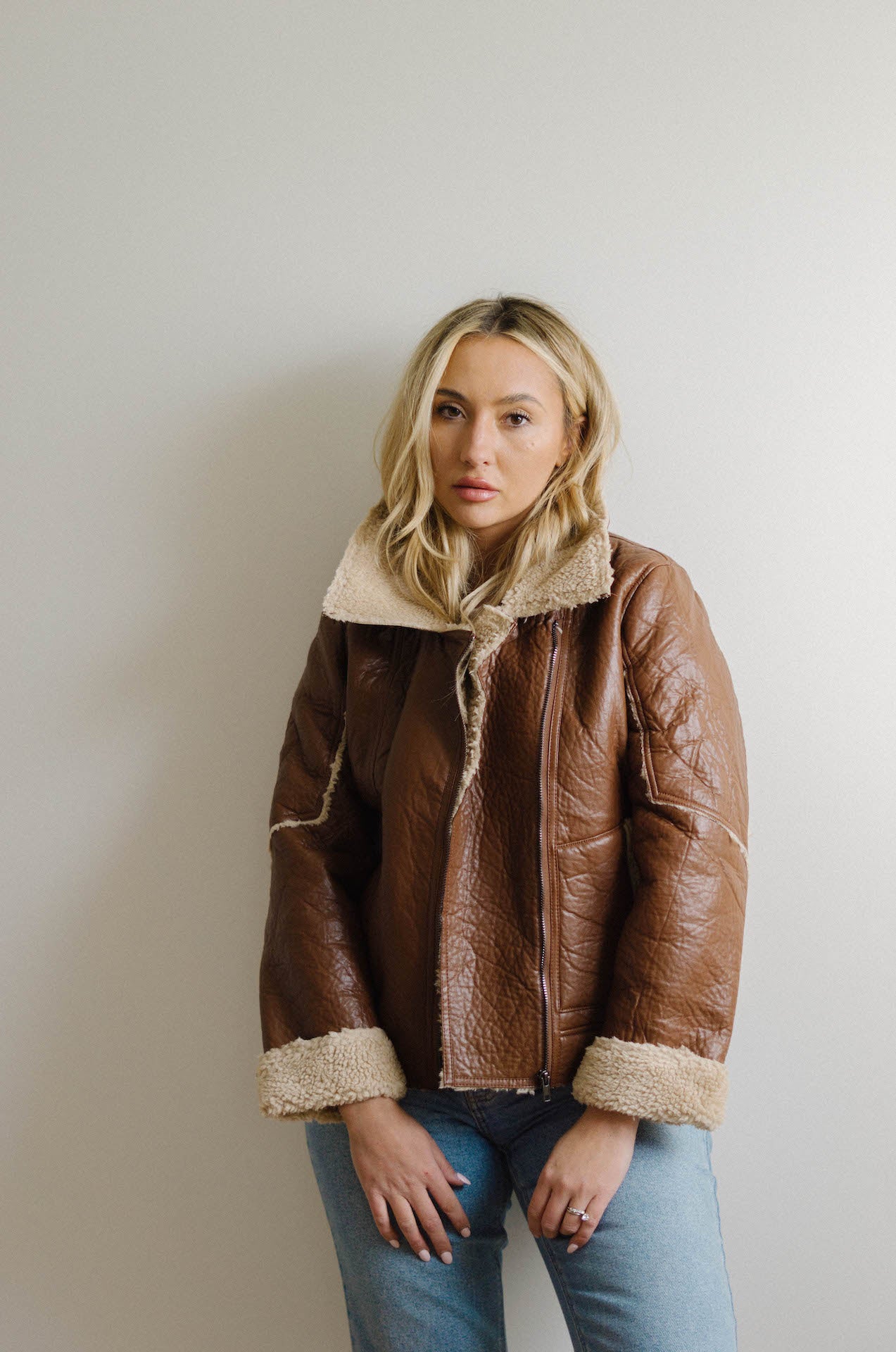 brown faux leather moto jacket with sherpa shearling lining