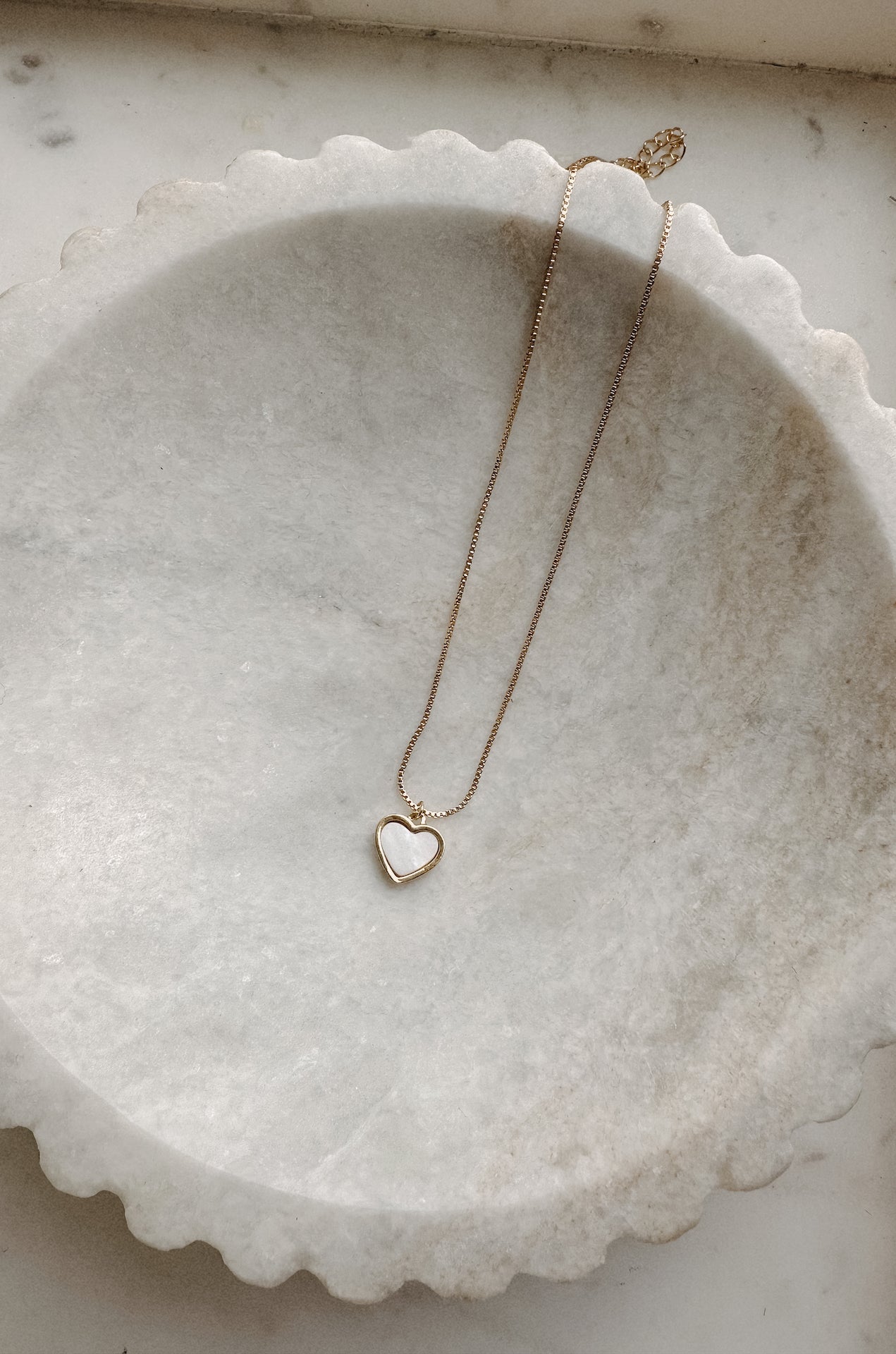 pearly gold heart necklace made from 18 karat gold