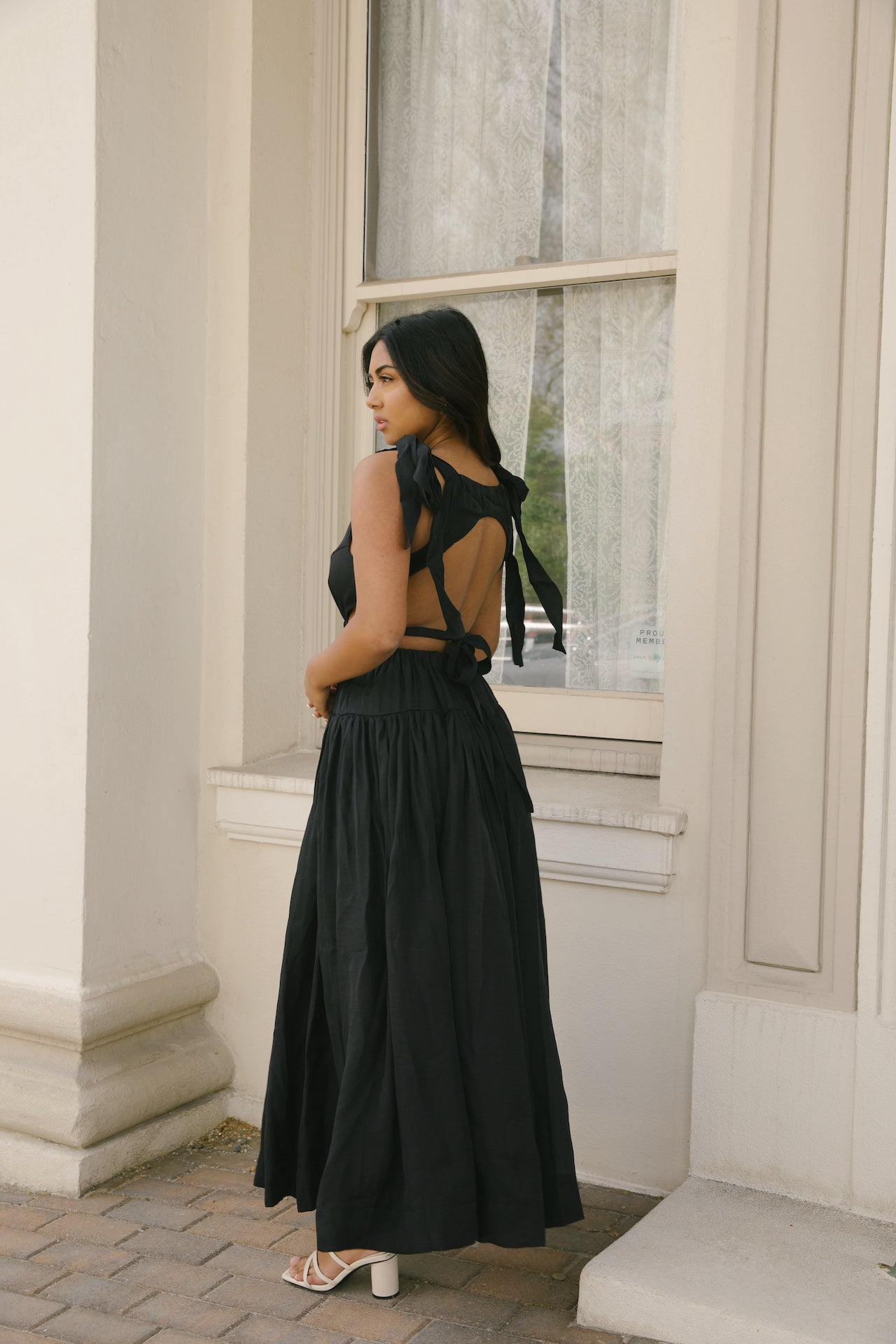 black cut out maxi dress with an open back
