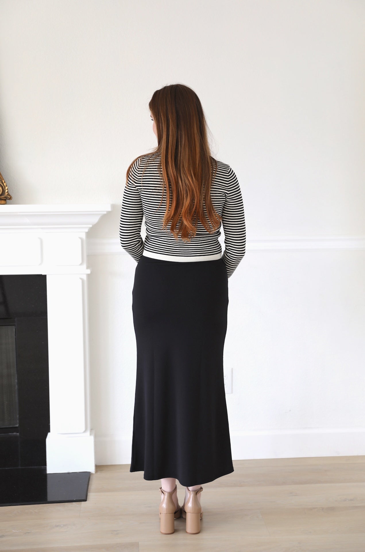 black high waisted midi maxi skirt that has stretch to it