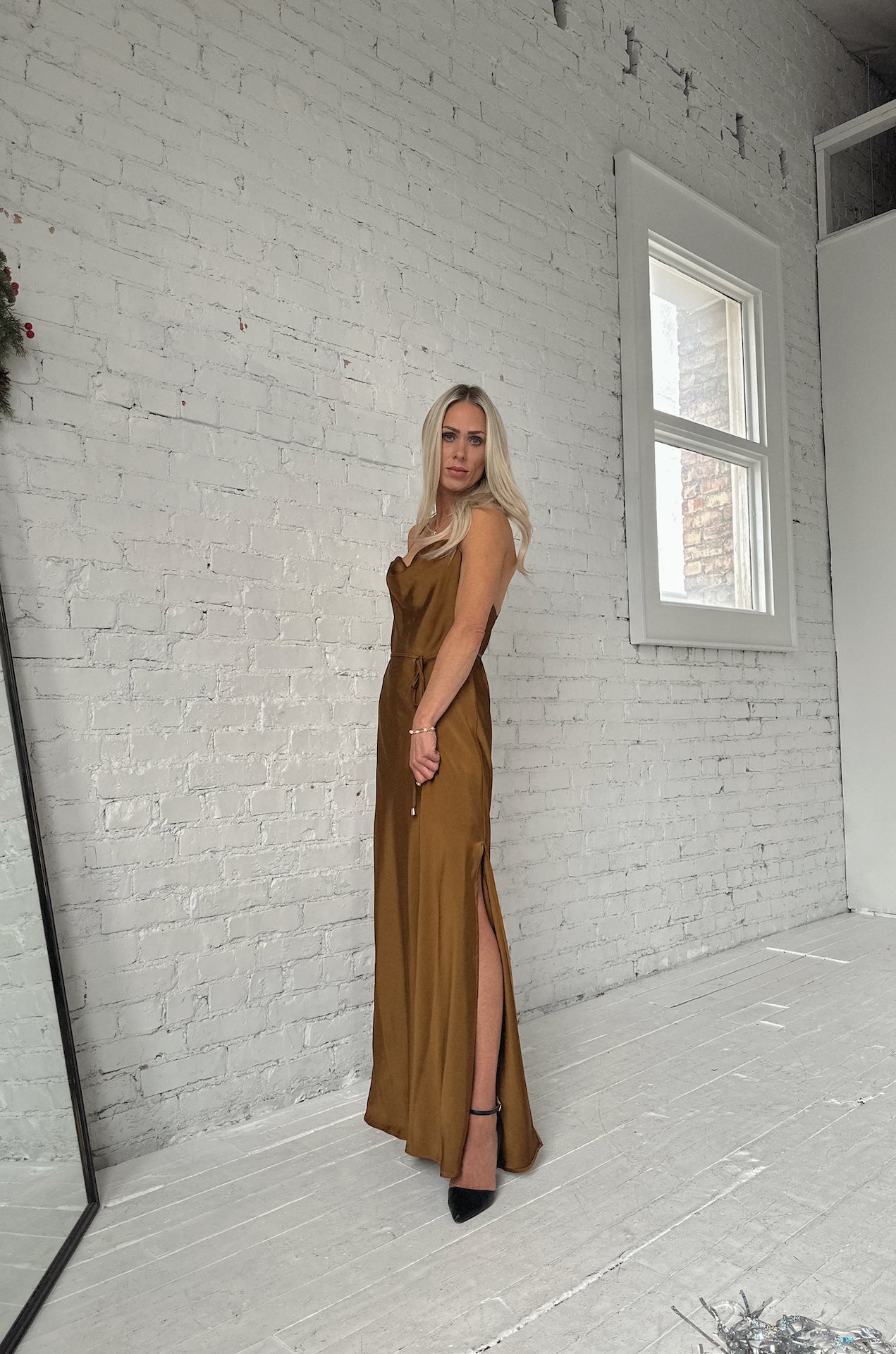 sleeveless bronze brown satin maxi dress with a cowl neckline and criss cross back