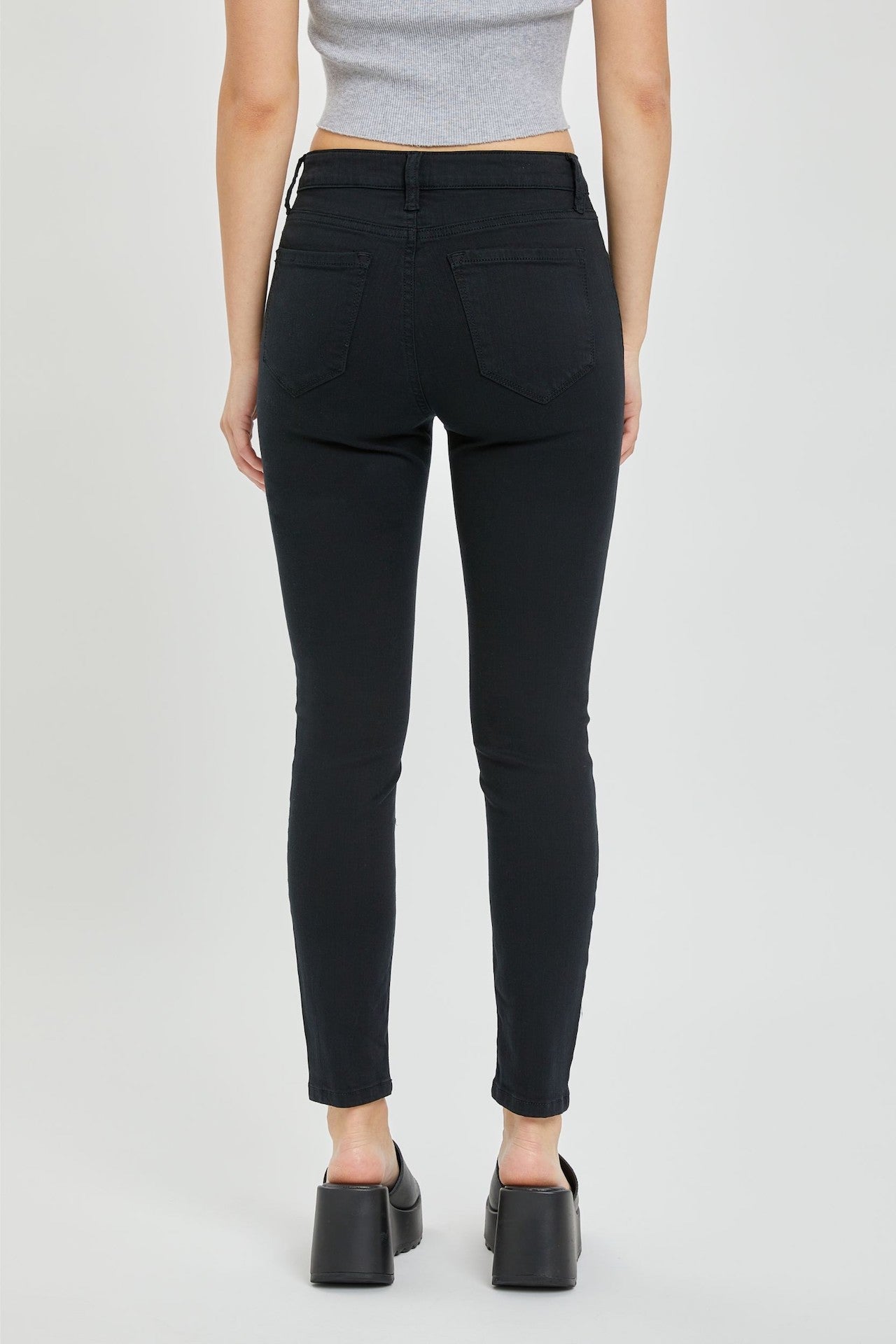 black mid rise cropped skinny jeans