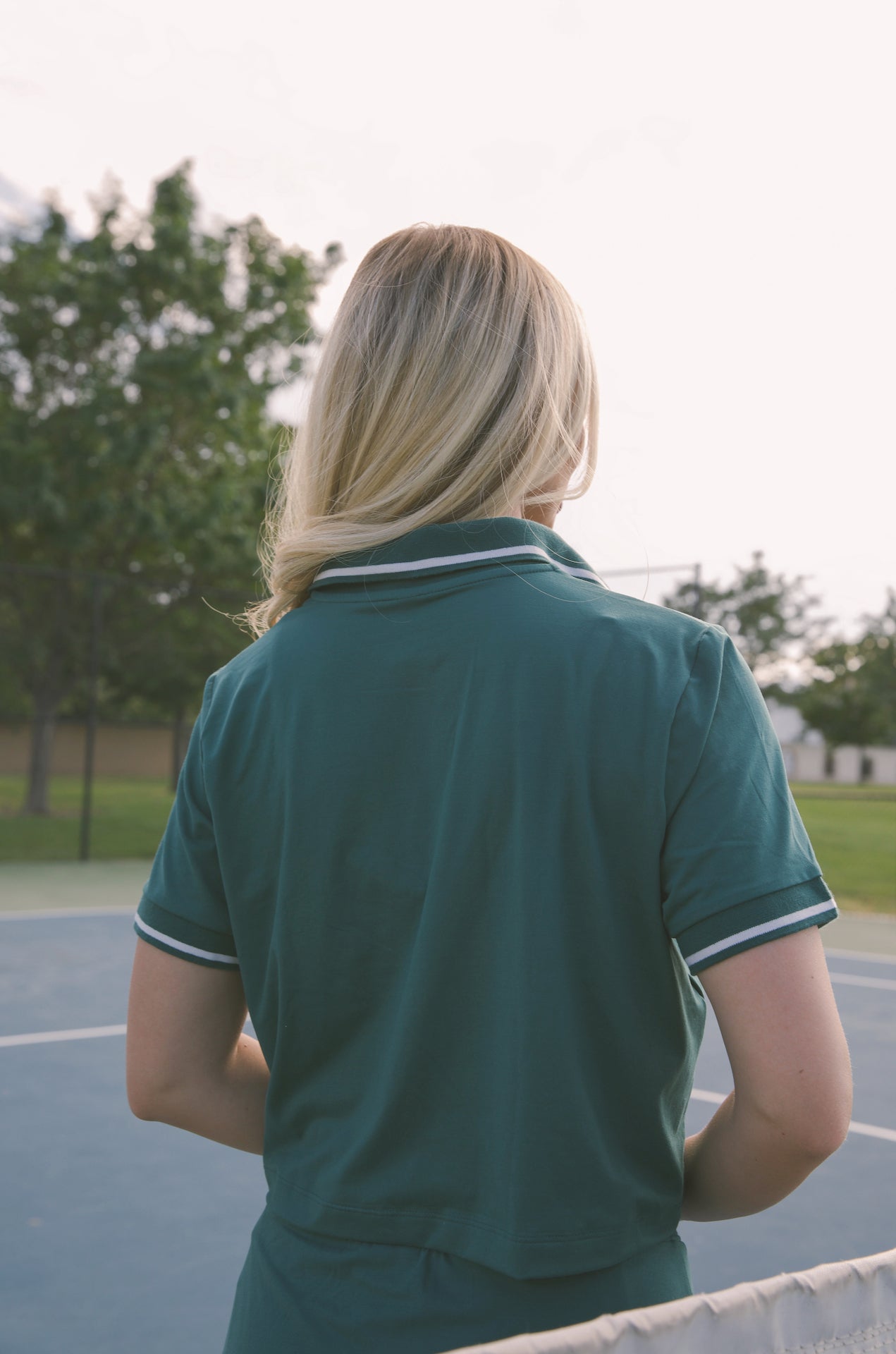 green cropped polo shirt