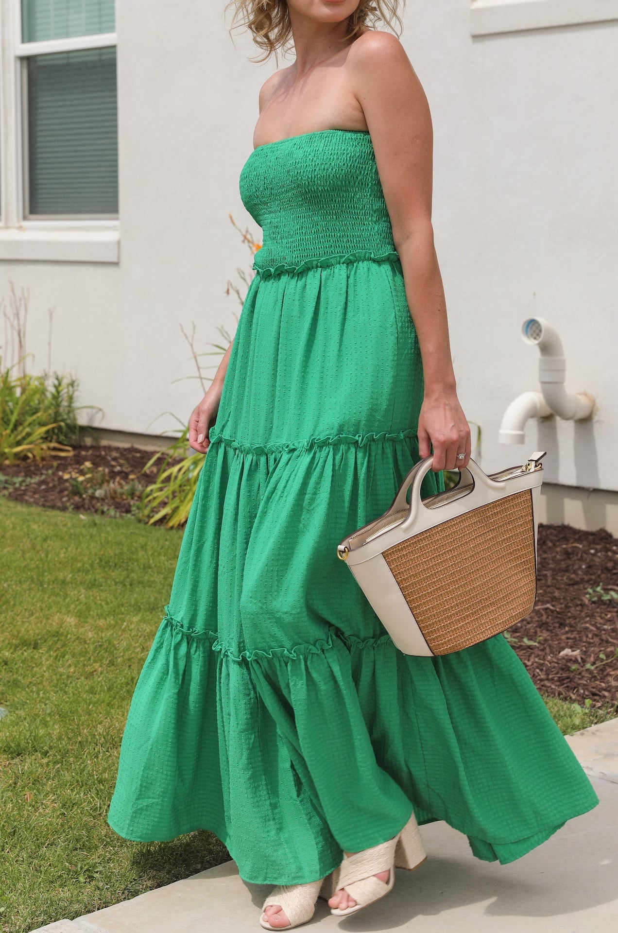 green strapless tube top maxi dress with a smocked bodice