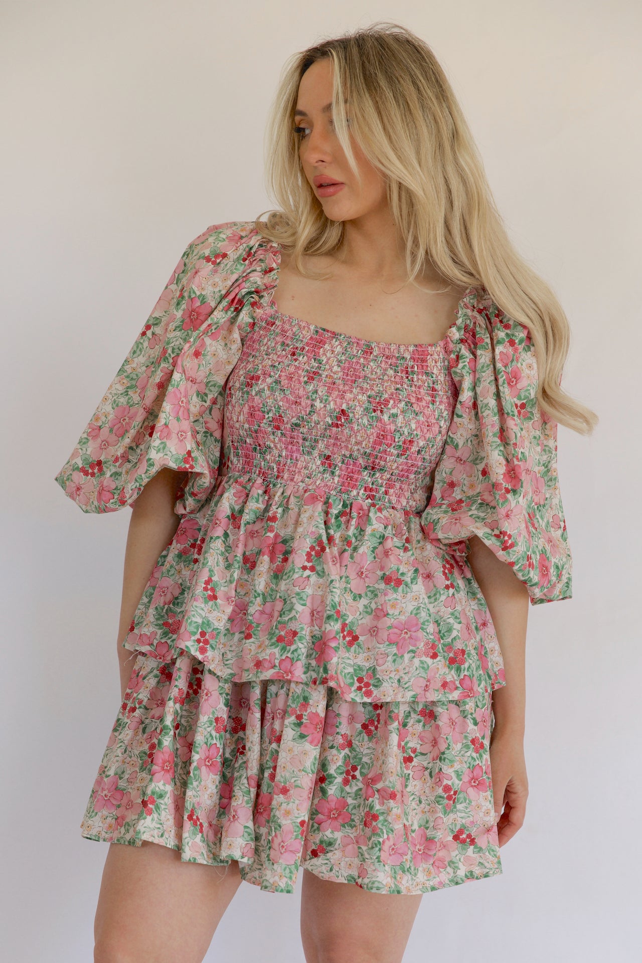 pink and green floral puff sleeve tiered mini dress that is a statement dress