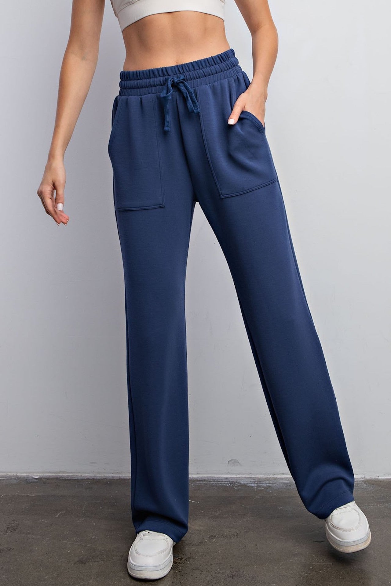 blue modal poly span sweatpants with pockets and an elastic waistband