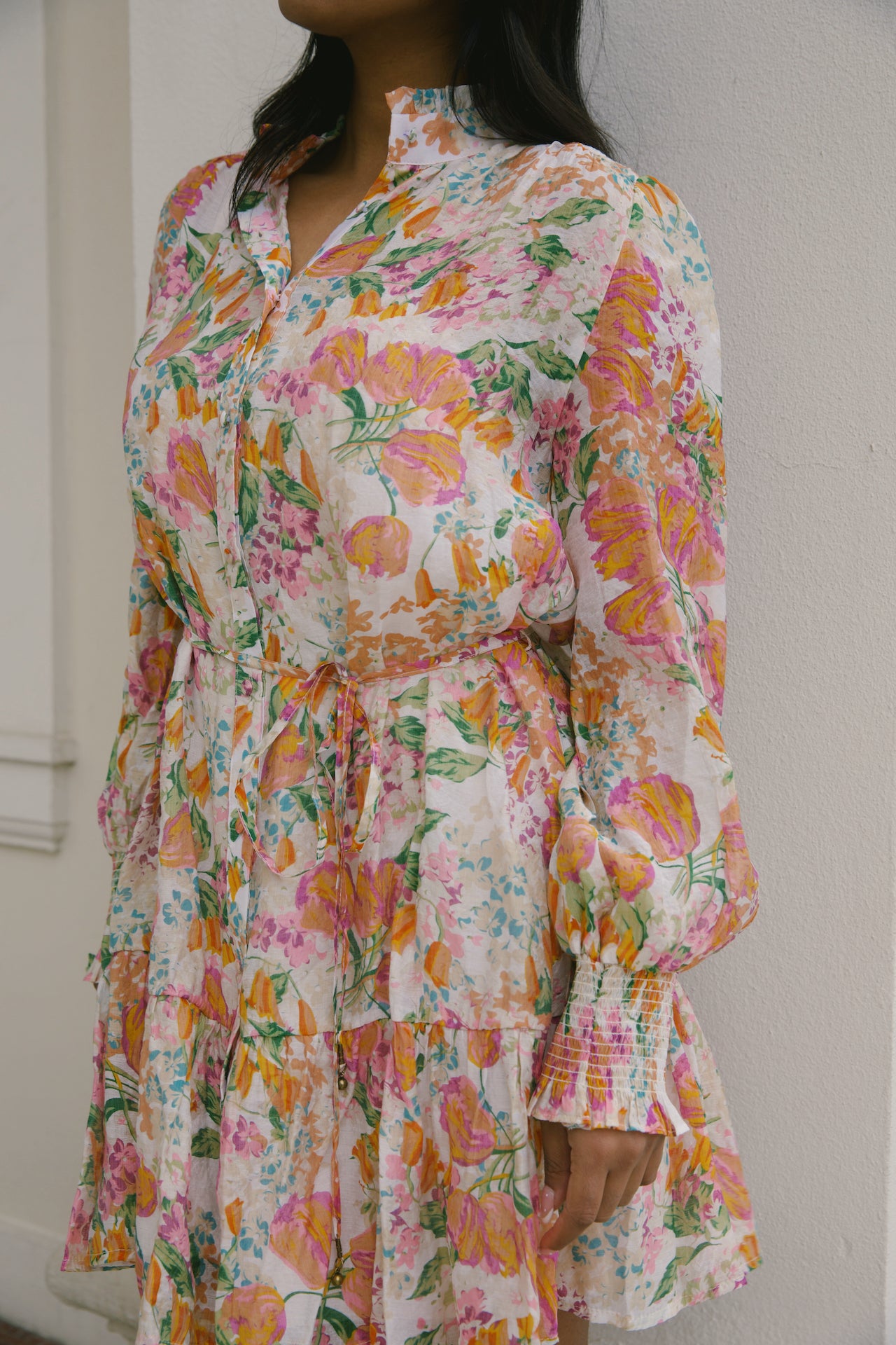 beige with orange floral mini dress with long sleeves and belted