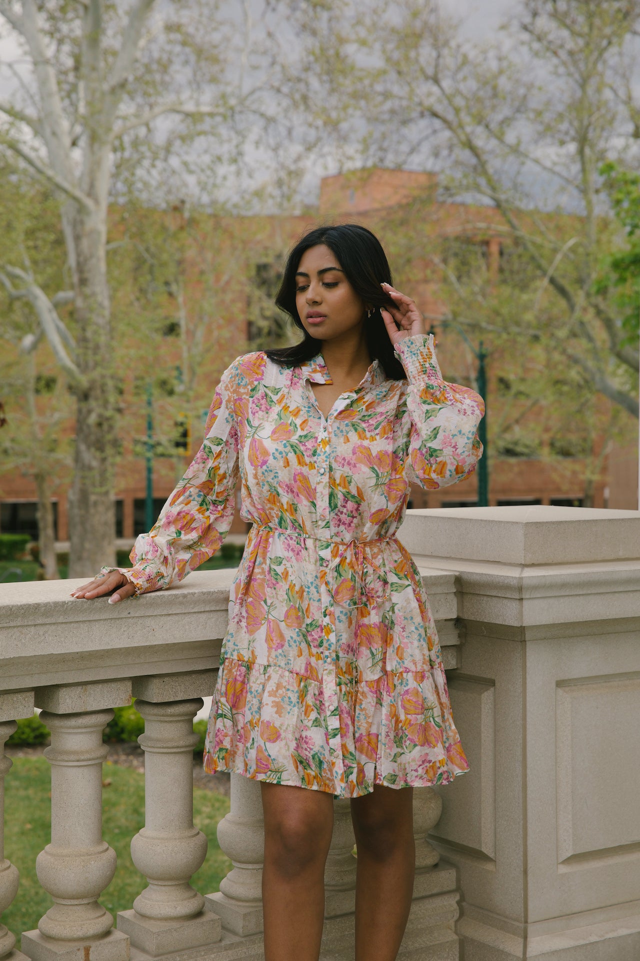 beige with orange floral mini dress with long sleeves and belted