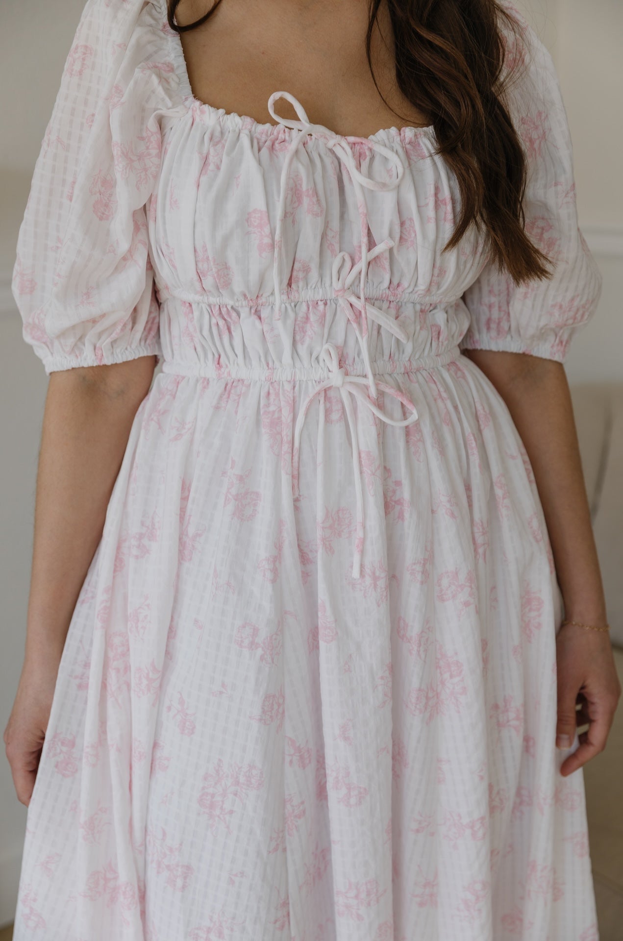 pink and white floral dress with puff sleeves and midi long length