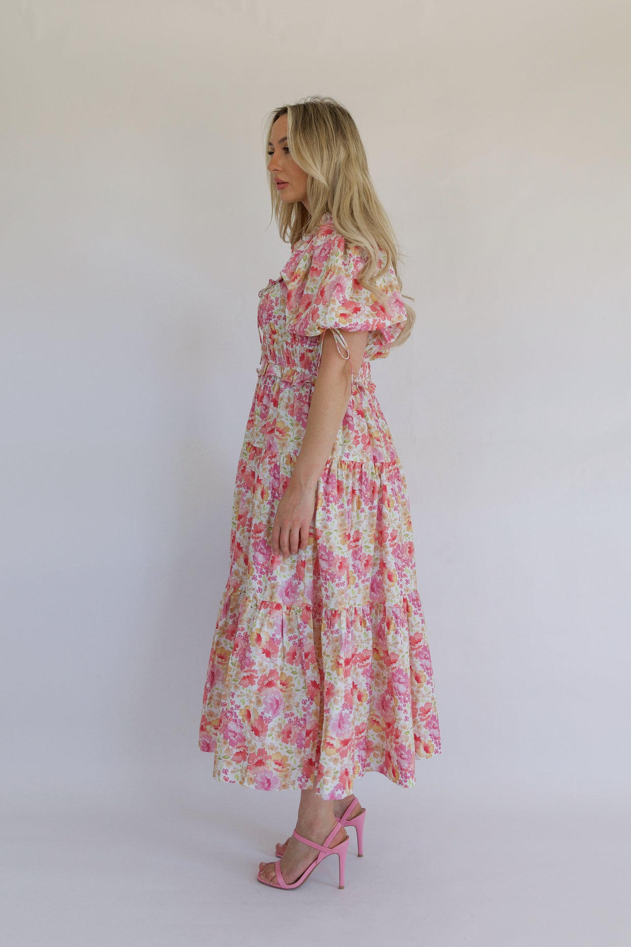 pink floral tiered maxi dress with pockets and puff sleeves